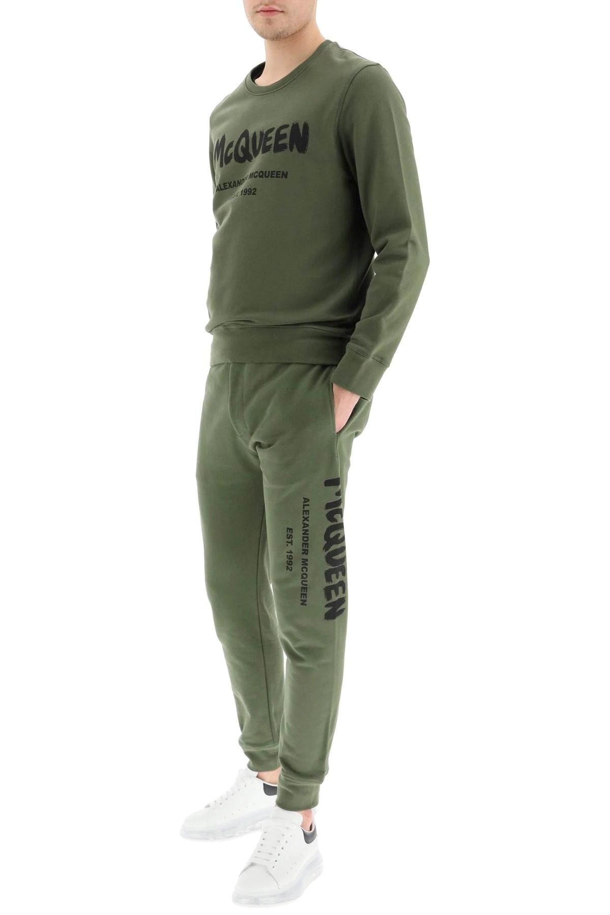 Alexander Mcqueen Logo Print Tapered Track Trousers In Green