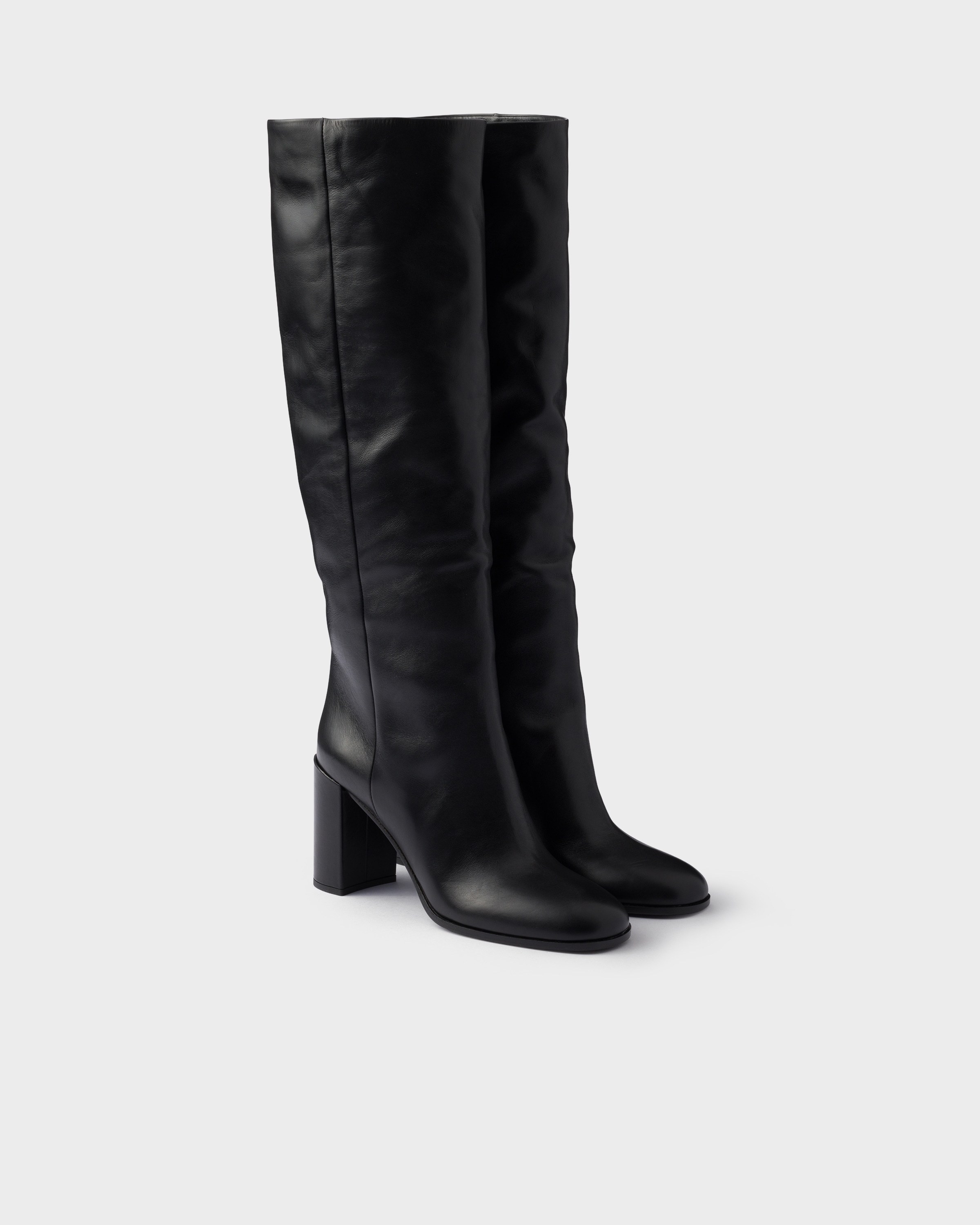 Prada Heeled Leather Boots In Black