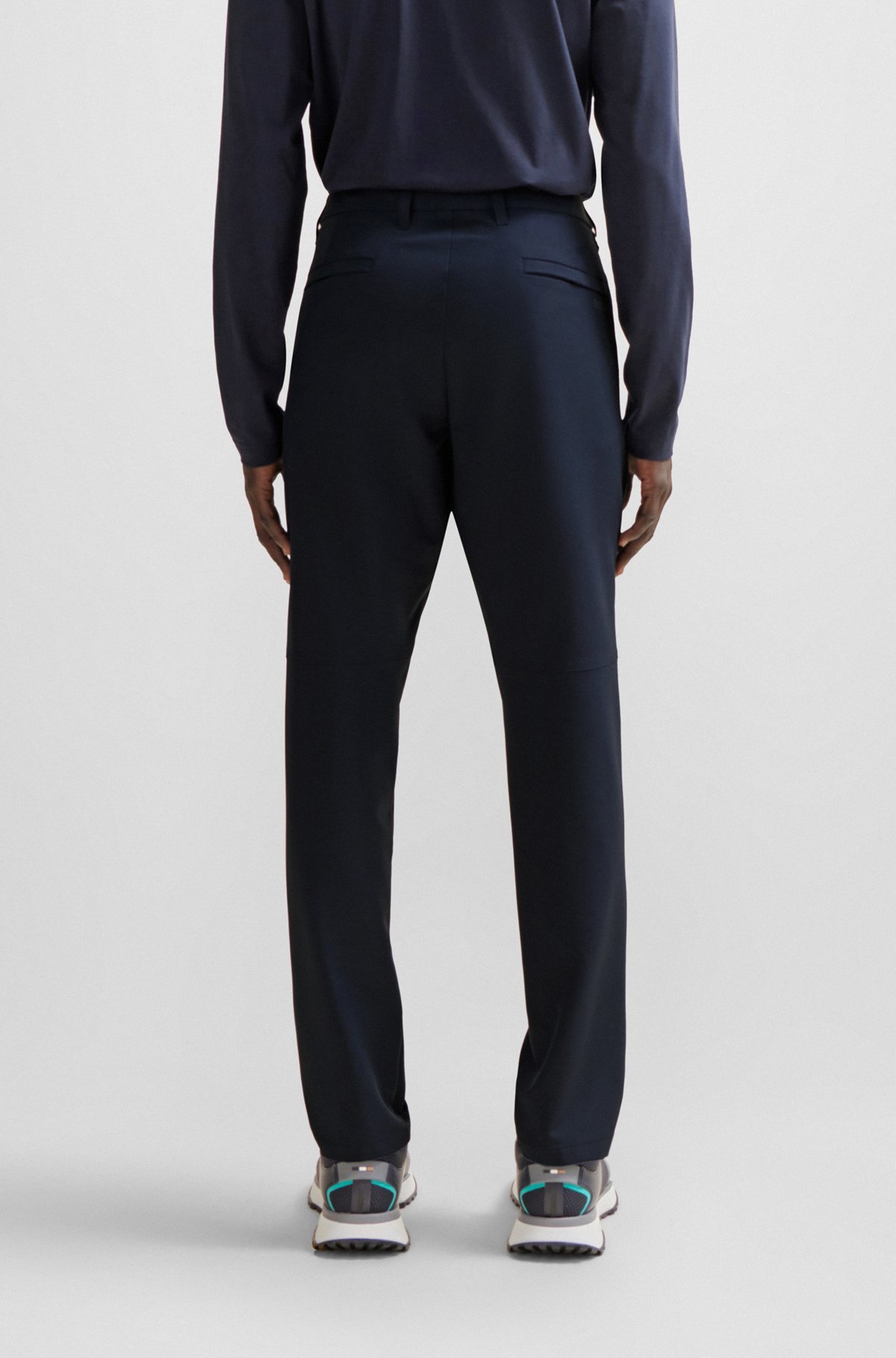 Hugo Boss Water-repellent Tapered Trousers In Black