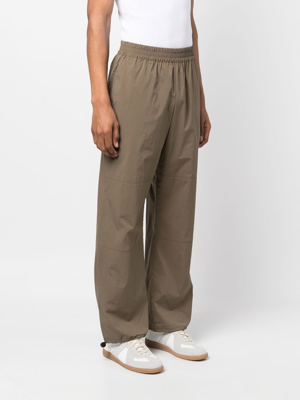 Studio Nicholson Loose-fit Elasticated-waist Trousers In Brown