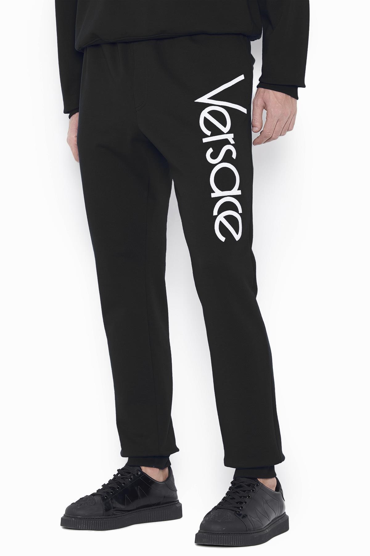 Versace Logo Sports Leg Retractor Pants In Black
