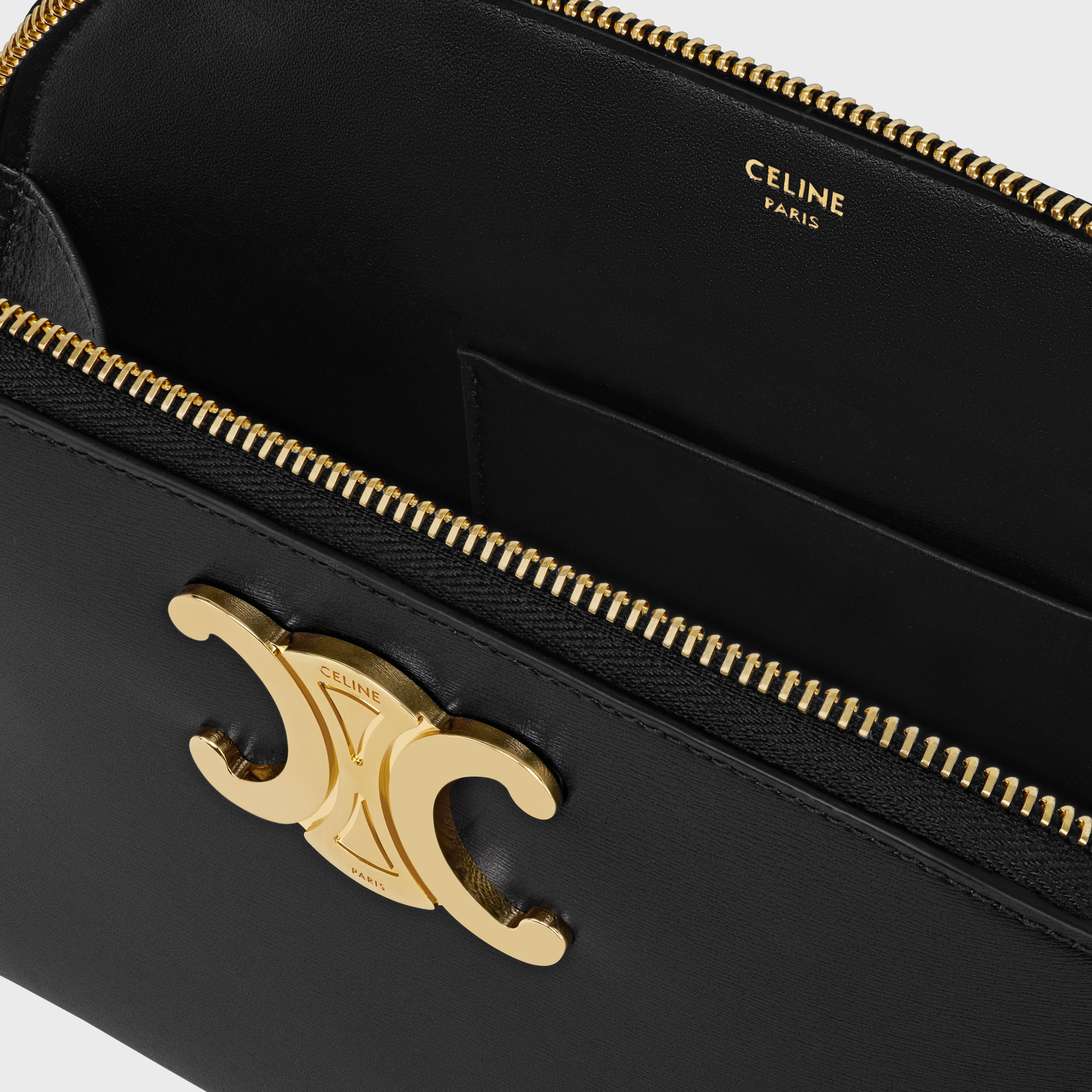 Celine Logo Clutch In Black