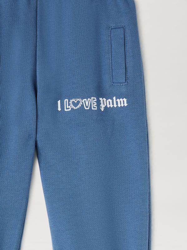 Palm Angels X Keith Haring Elastic Waist Sweatpants In Blue