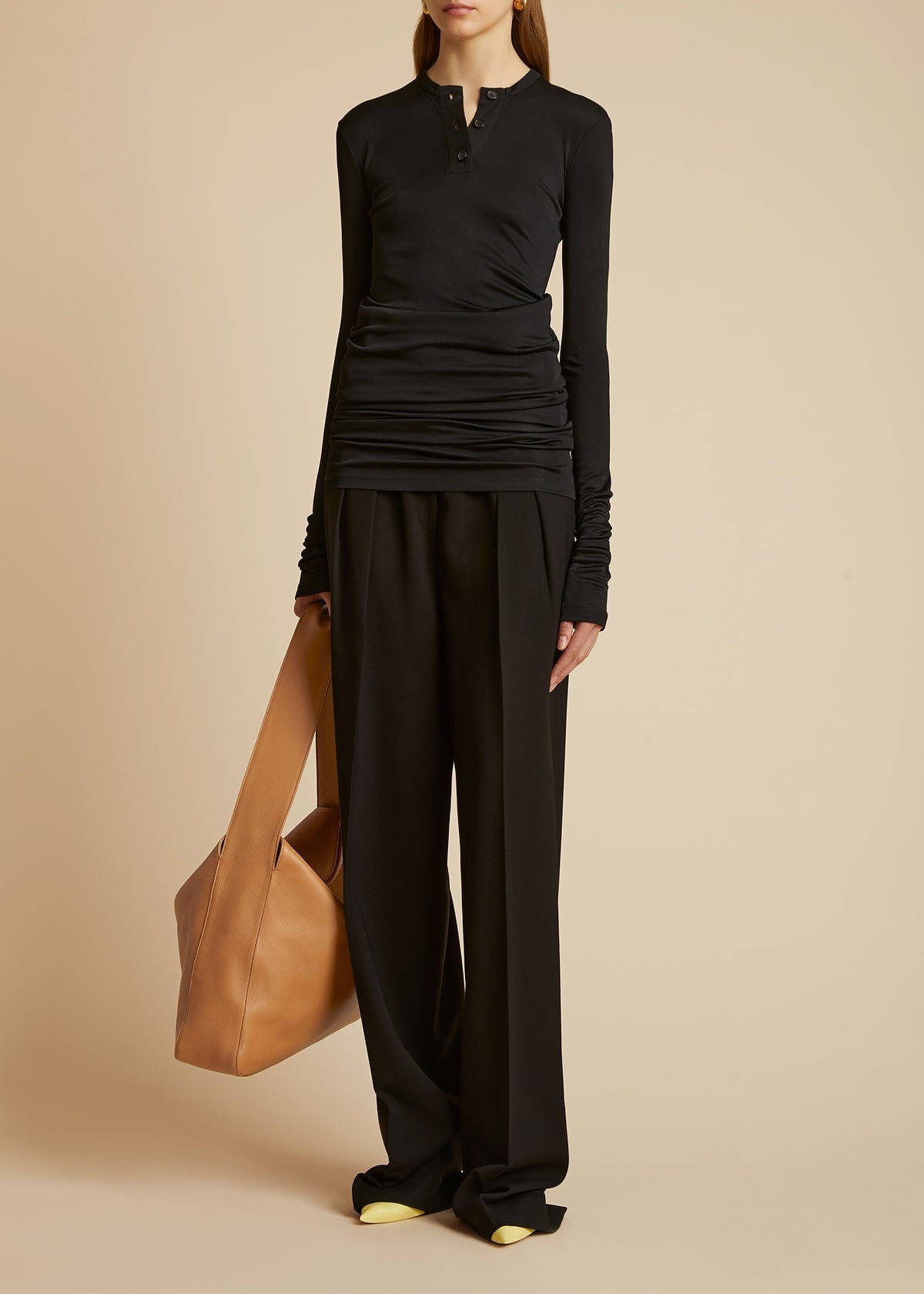 Khaite Cessie Pleated High-waisted Trousers In Black