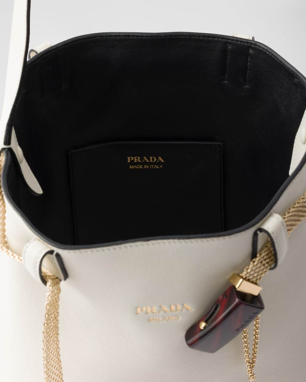 Prada Logo-print Shoulder Bag In White/black