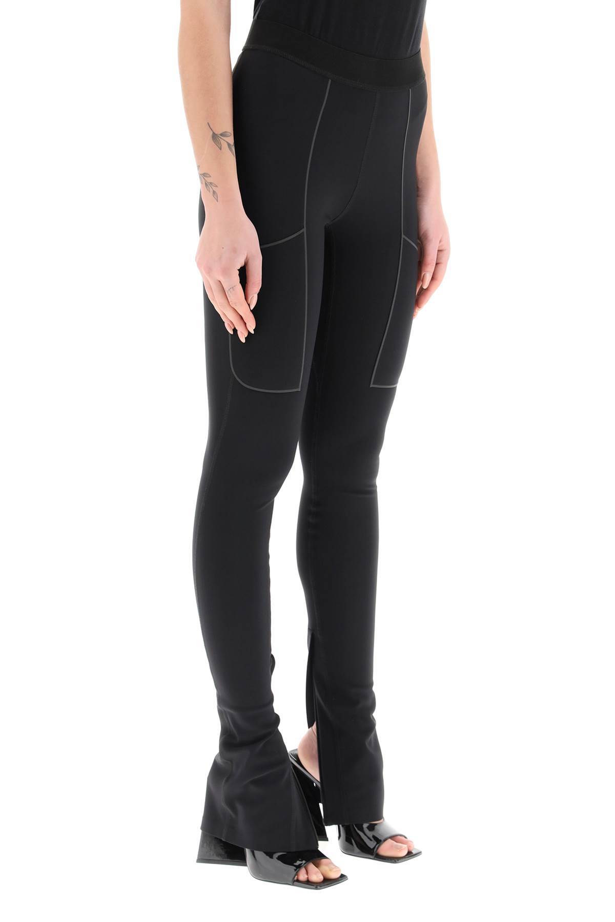 Coperni Stretch-design Slit Leggings In Black