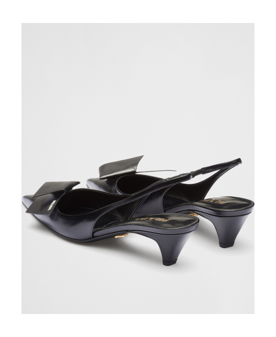 Prada Elegant Leather Slingback Pumps With Pointed Toe In Black