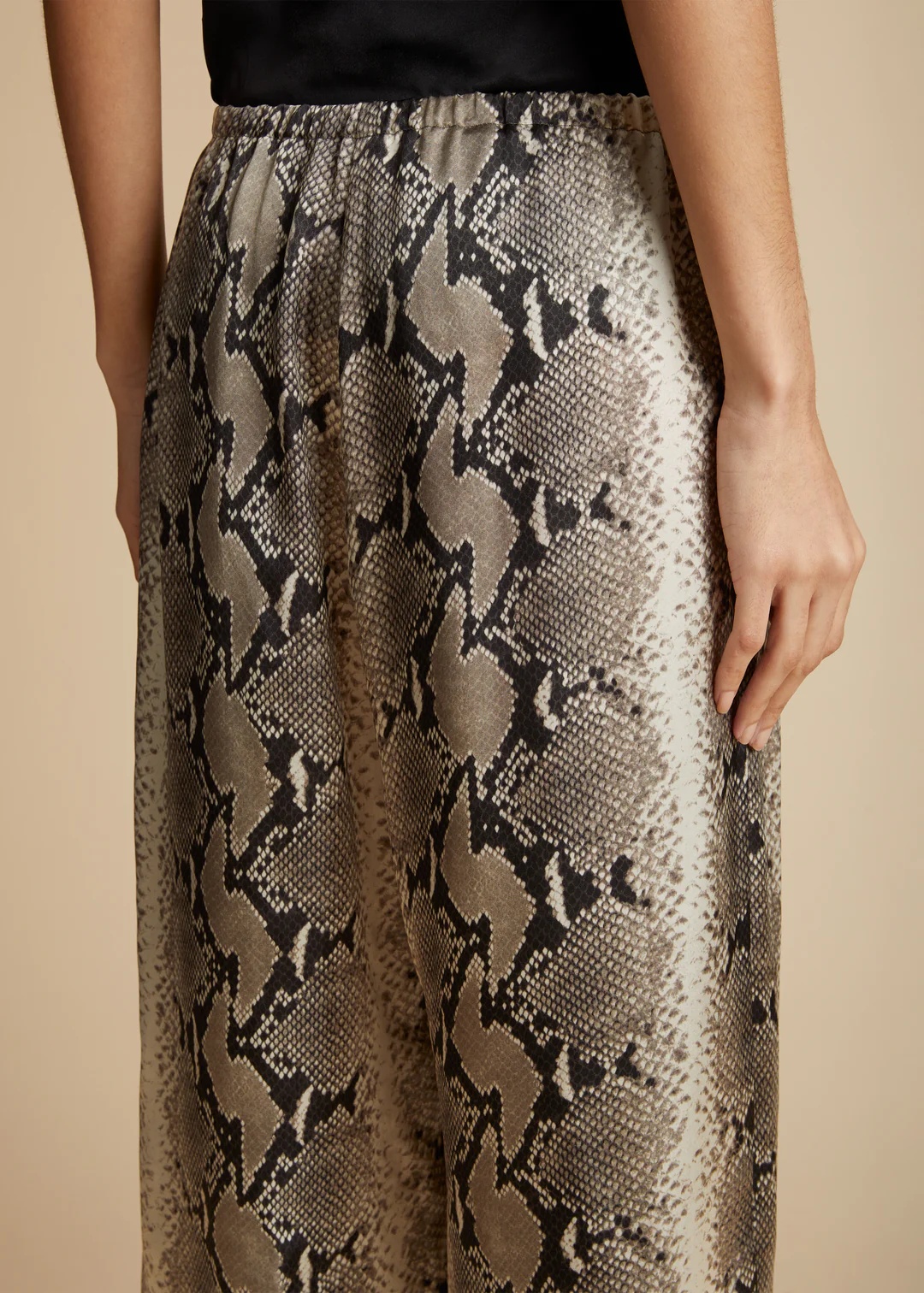 Khaite Mindy Snake-print Crop Trousers In Brown