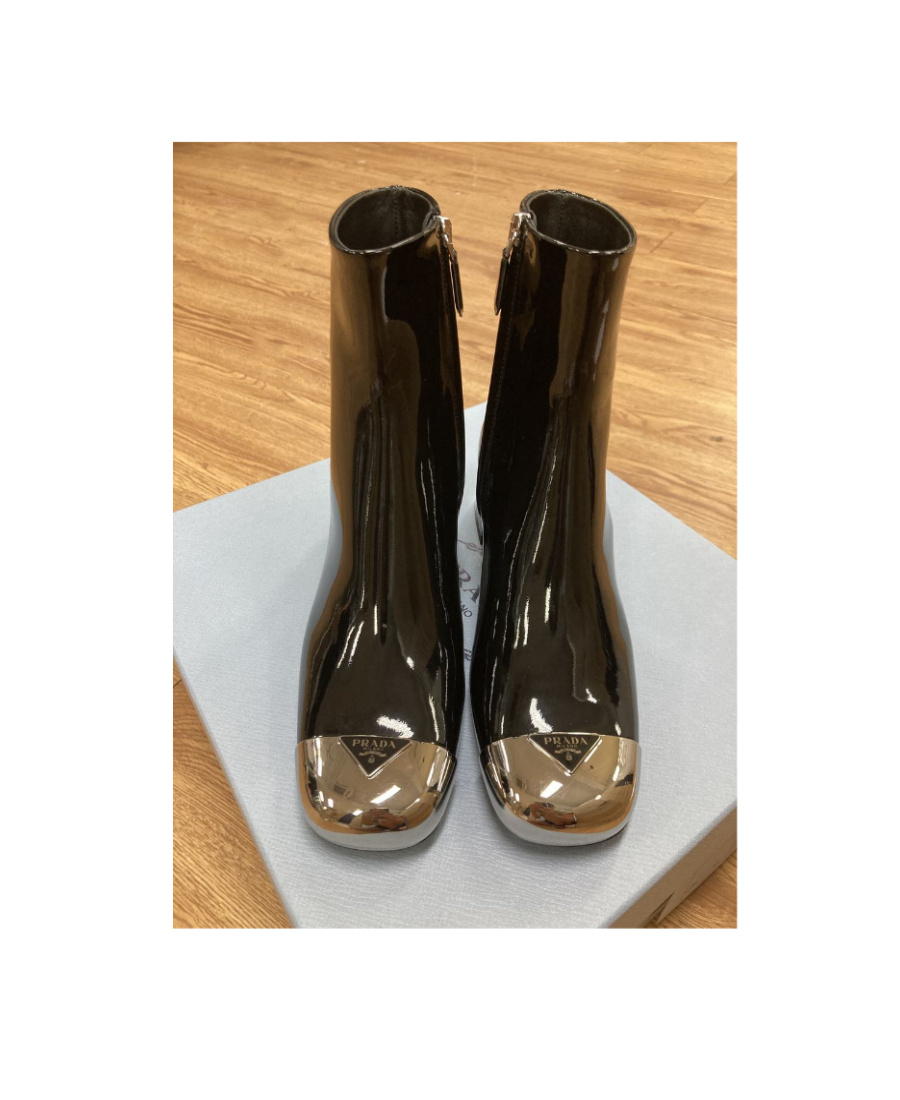Prada Triangle Logo Plaque Boots In Black