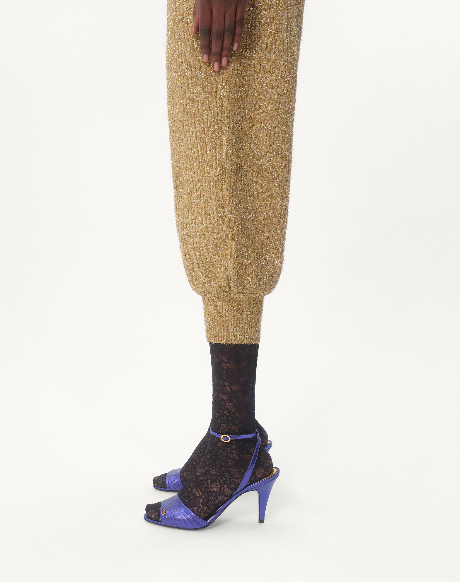 Shop Valentino Lurex Knit Trousers In Golden