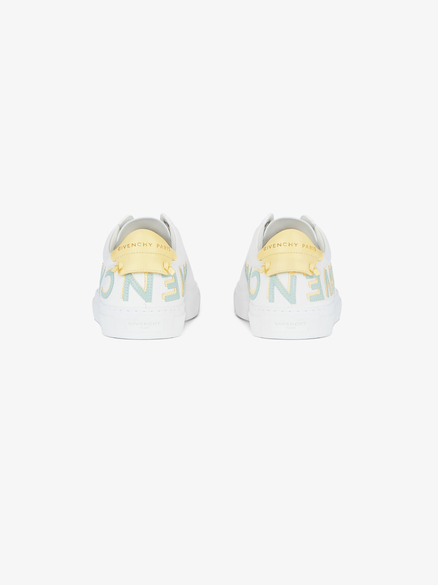 Givenchy Reverse Logo Low-top Sneakers In White