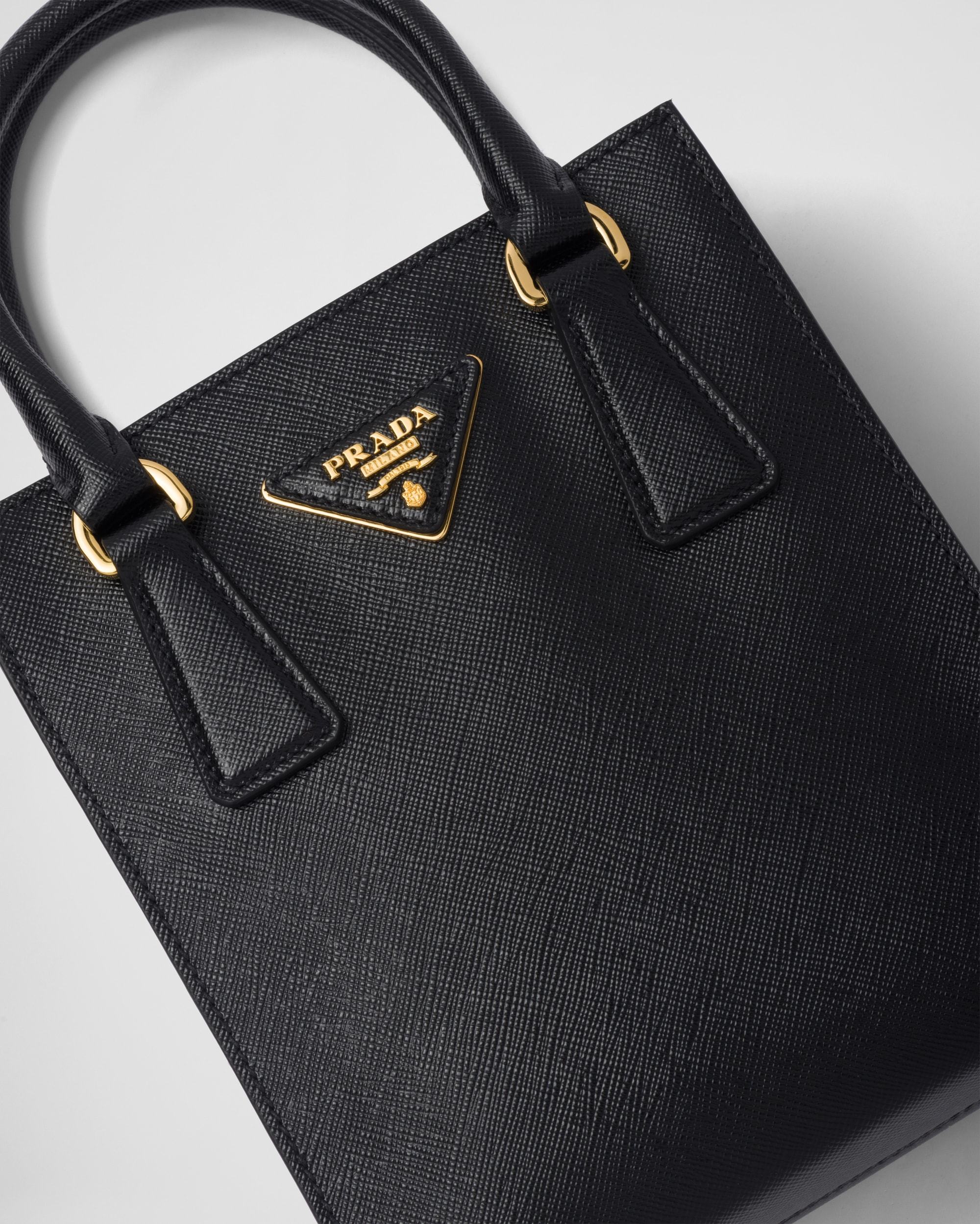 Shop Prada Saffiano Leather Handbag In Black