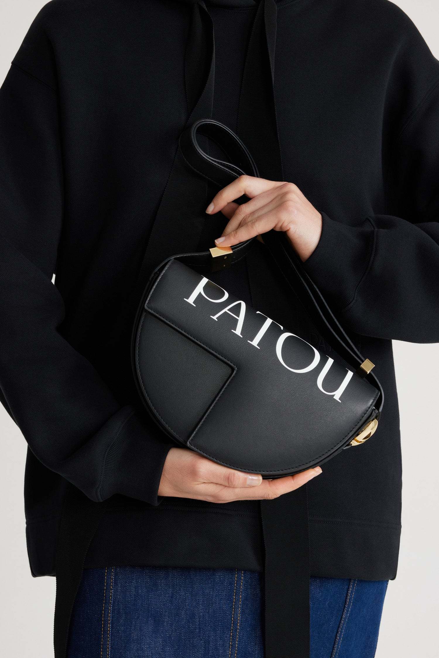 Patou Logo Print Fold-over Top Shoulder Bag In Black