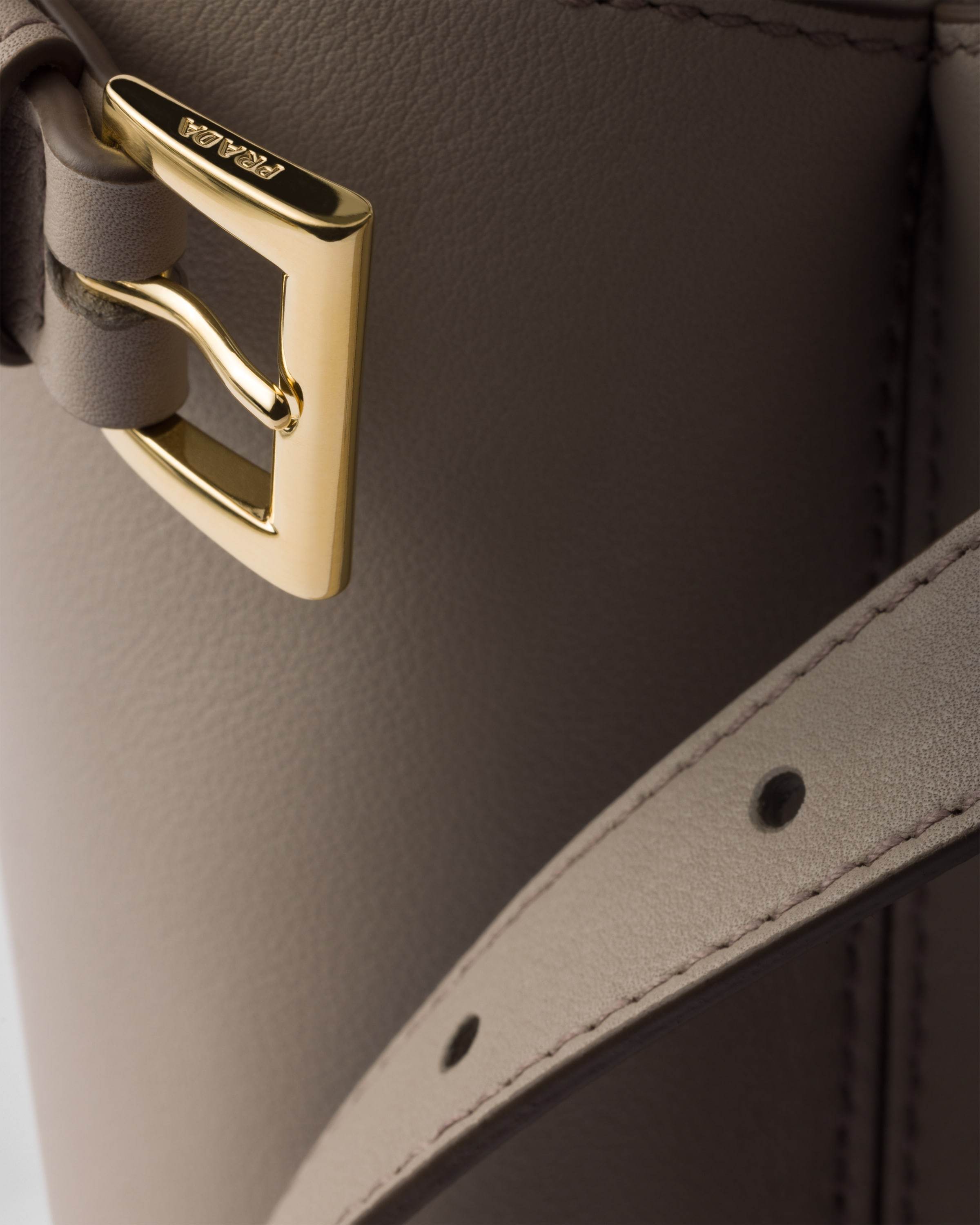 Prada Buckle Medium Leather Handbag With Double Belt In Gray