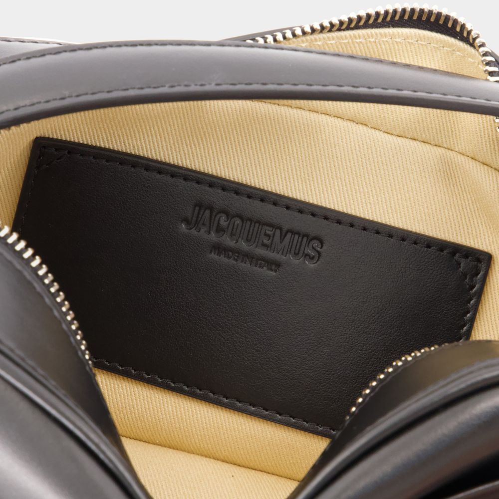 Shop Jacquemus Zippered Shoulder Bag In Black