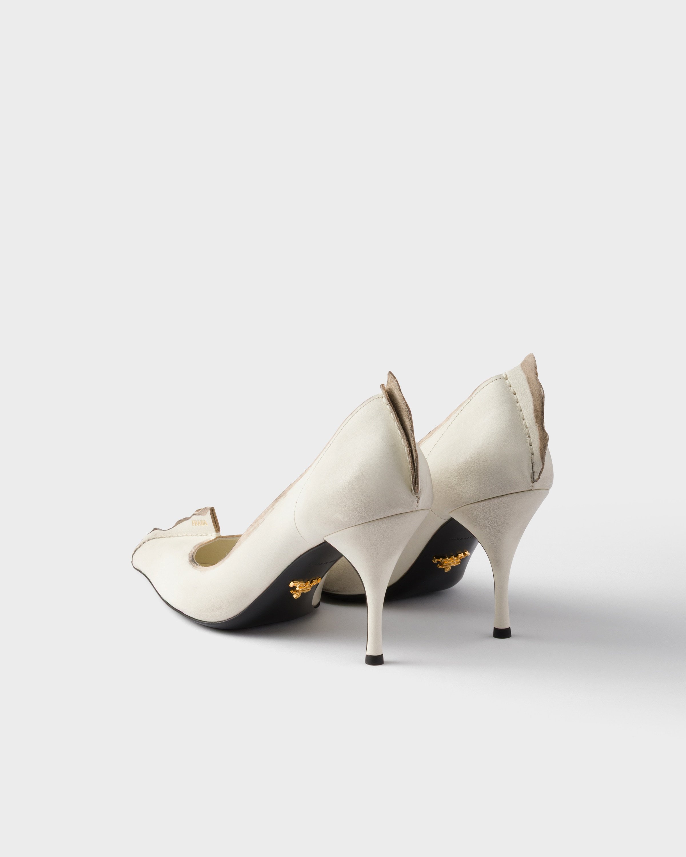 Prada Antiqued Leather Pumps In White
