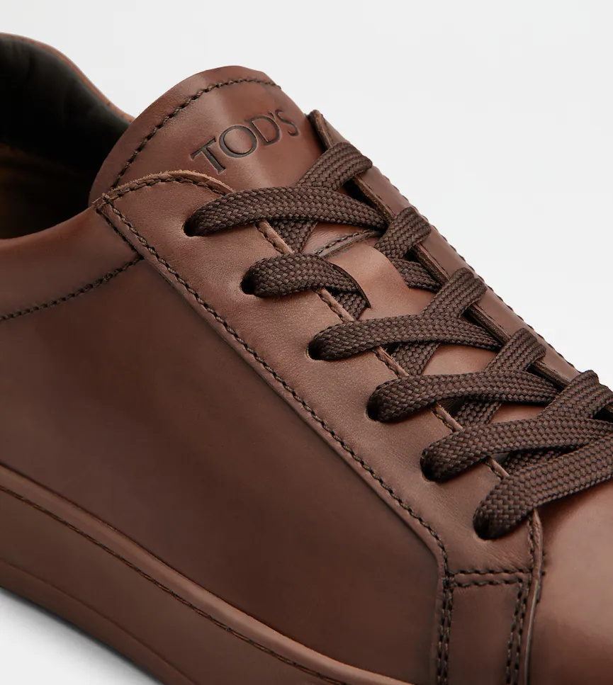 Tod's Allacciata Cassetta Rubber-trimmed Glossed-leather Sneakers In Brown