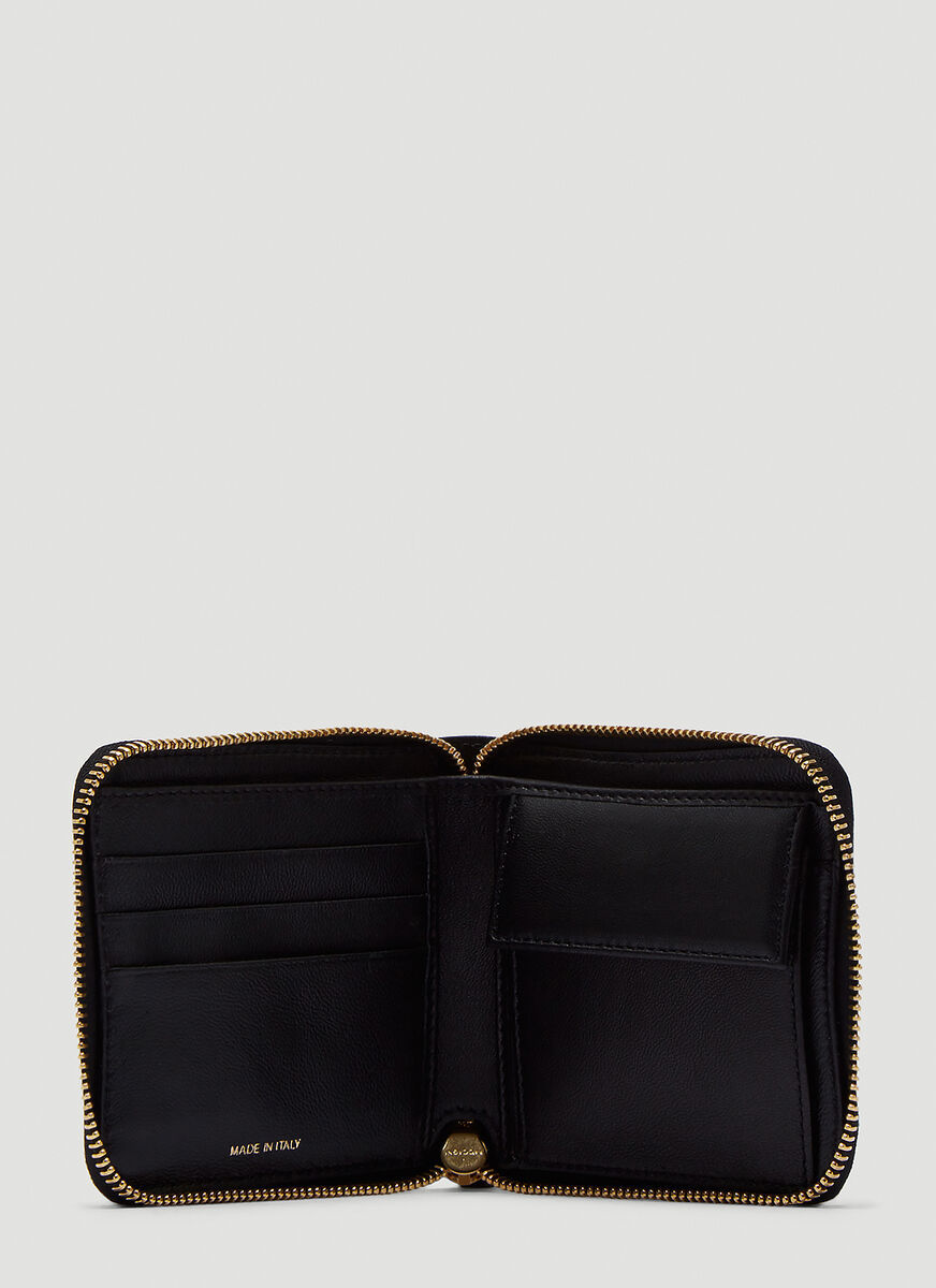 Shop Marni Logo-debossed Zip Wallet In Black