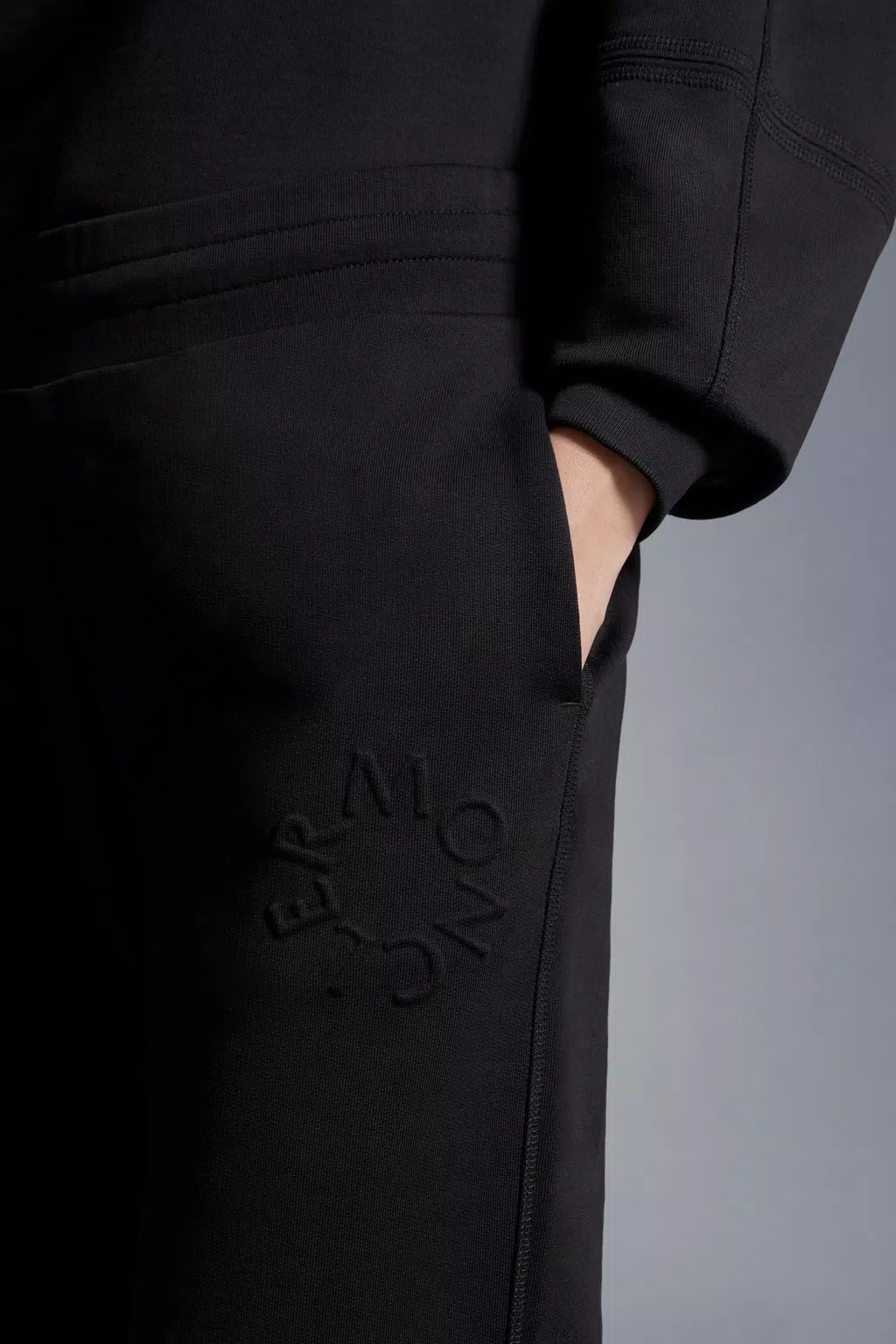 MONCLER EMBOSSED LOGO TRACKPANTS 