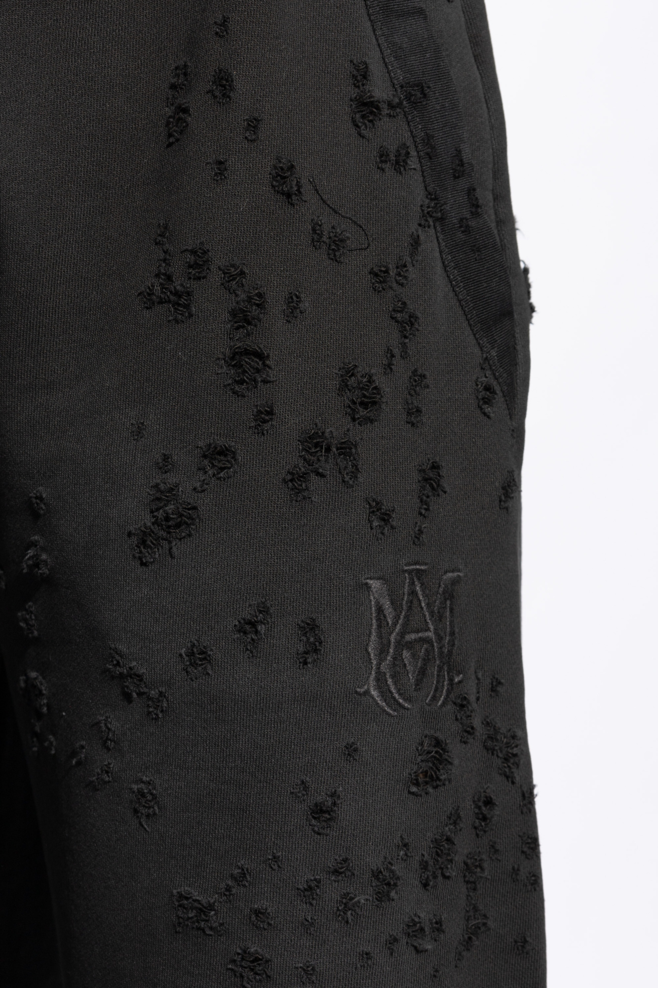Amiri Distressed Finish Straight-legged Jogging Trousers In Black