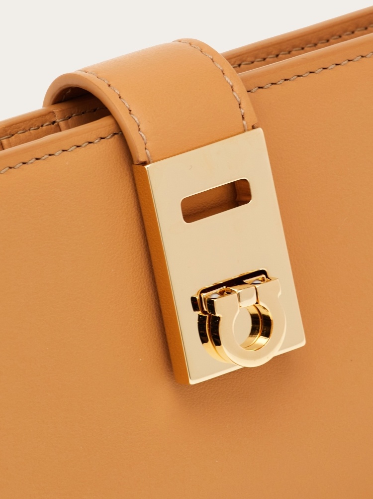 Ferragamo Hug Series Horse Strap Buckle Wallet In Brown