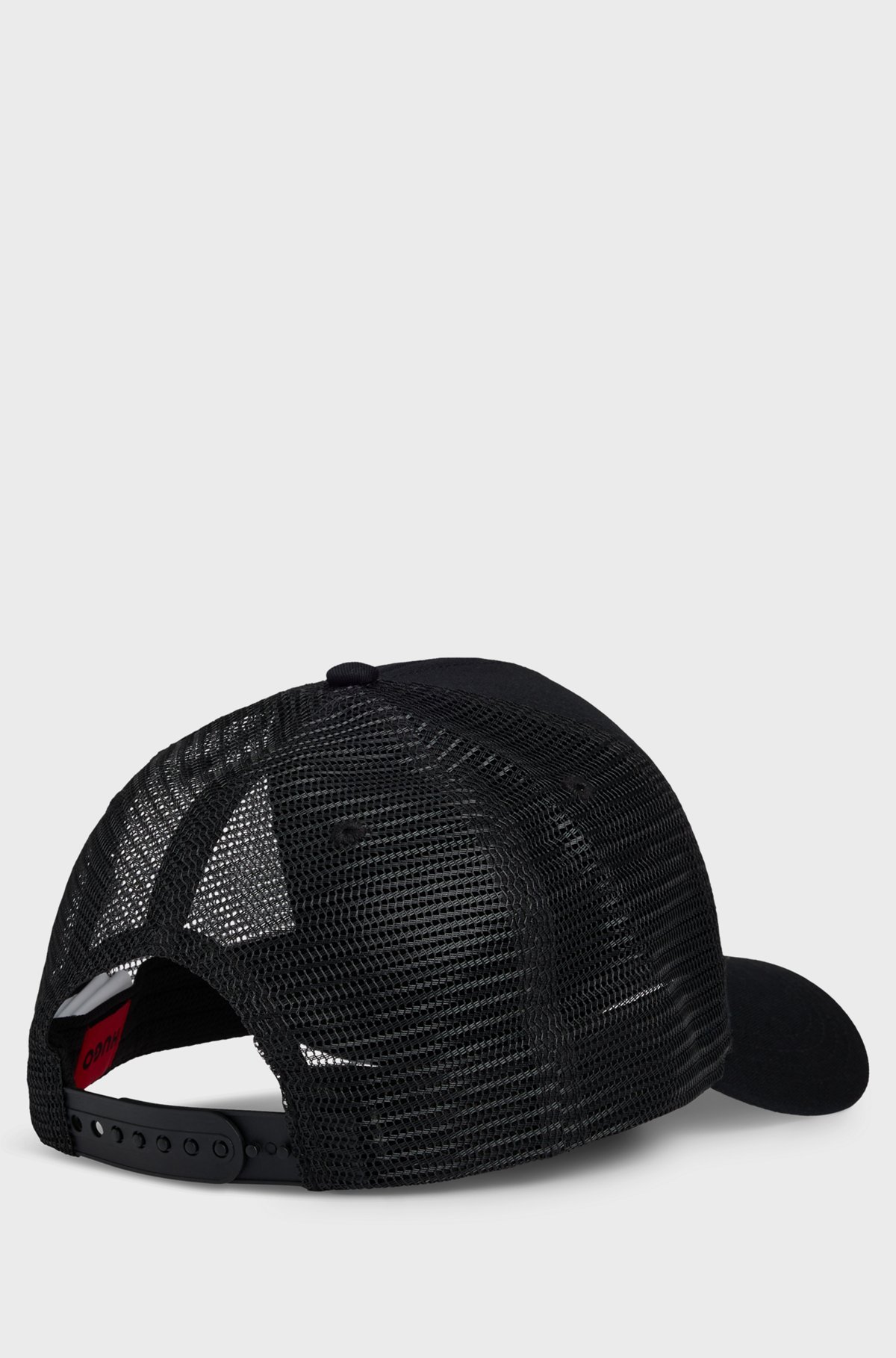 Hugo Boss Embossed Embroidered Logo Trucker Cap In Black