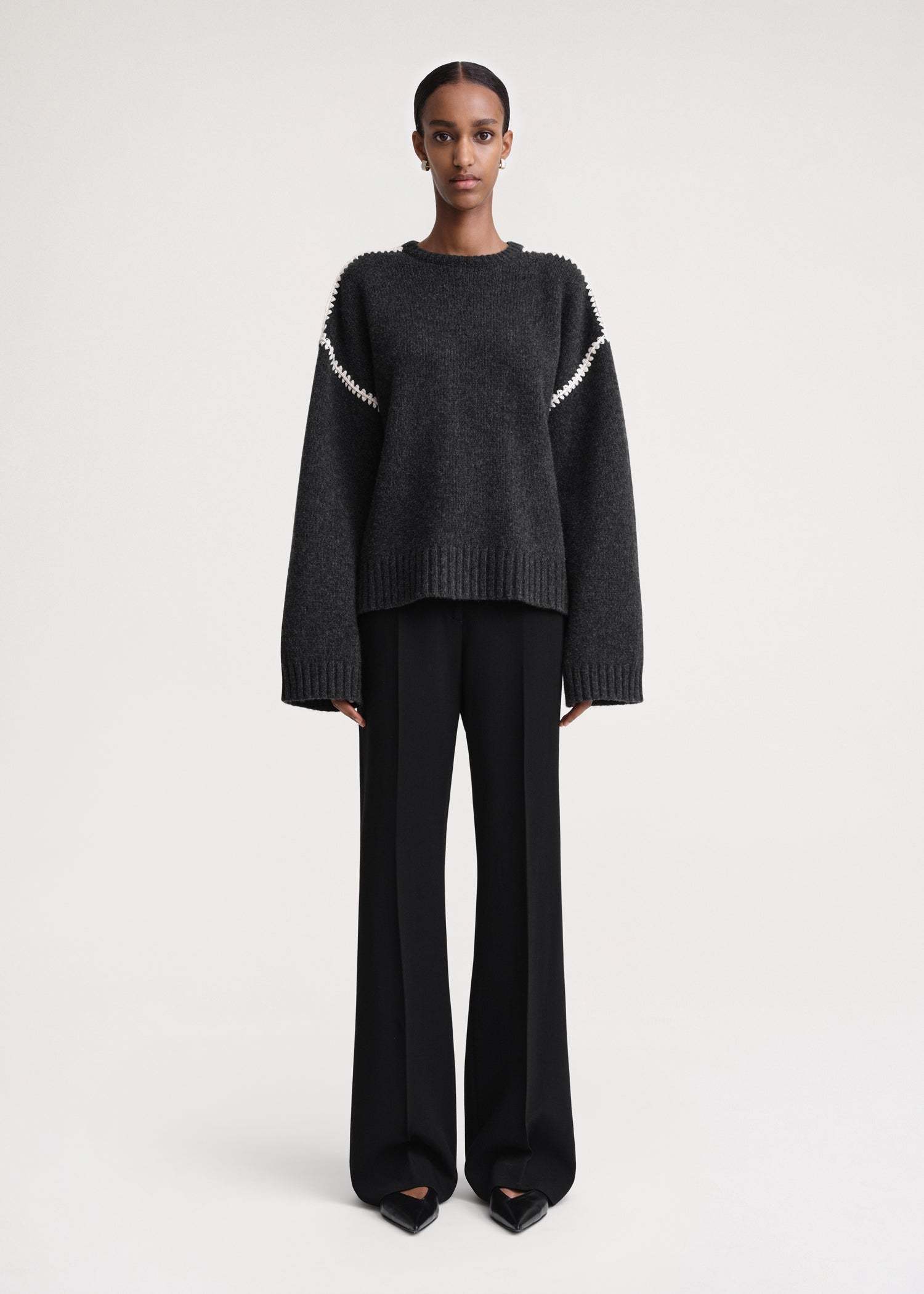 Shop Totême Whipstitched Wool Jumper In Black