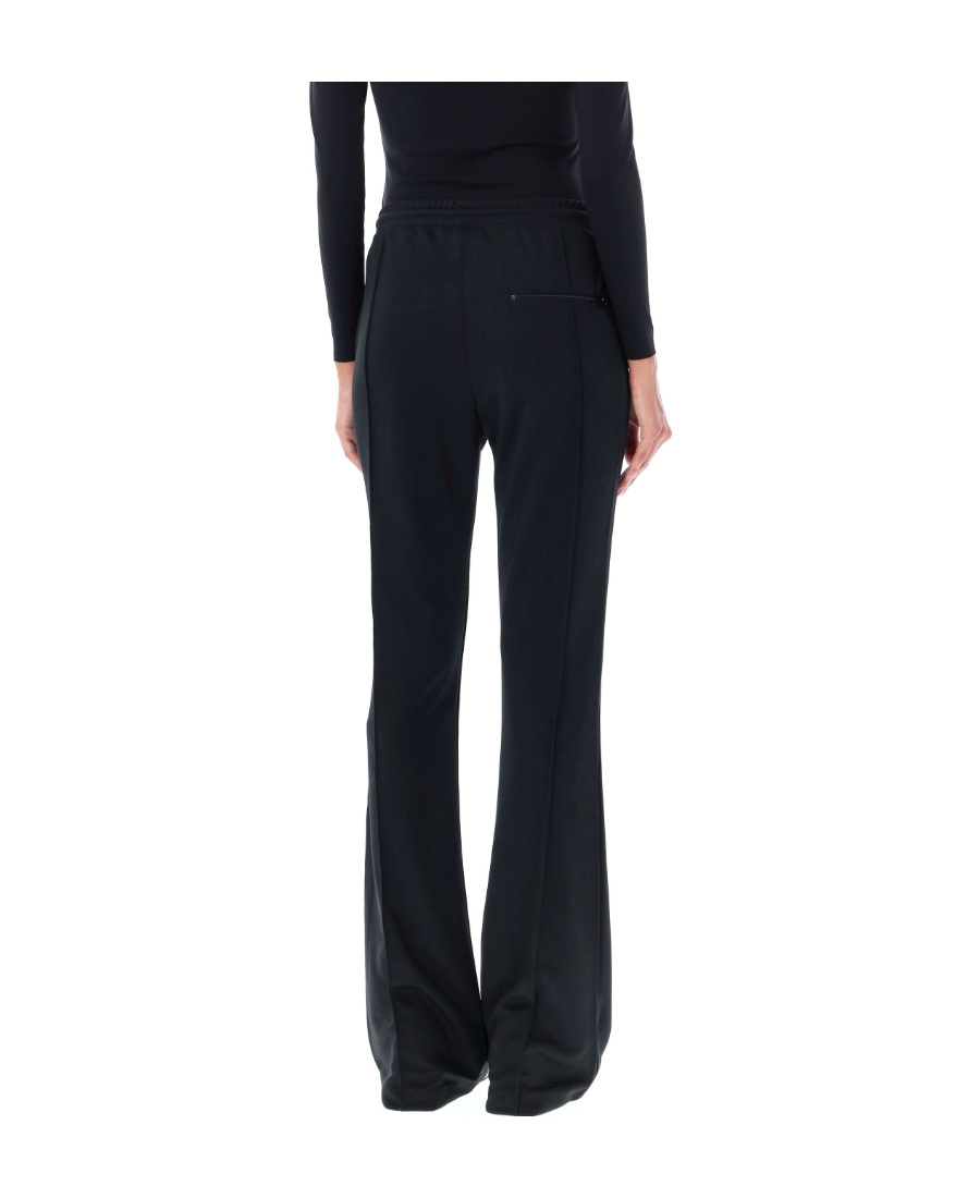 Shop Courrèges Logo-embroidered Flared Trousers In Black