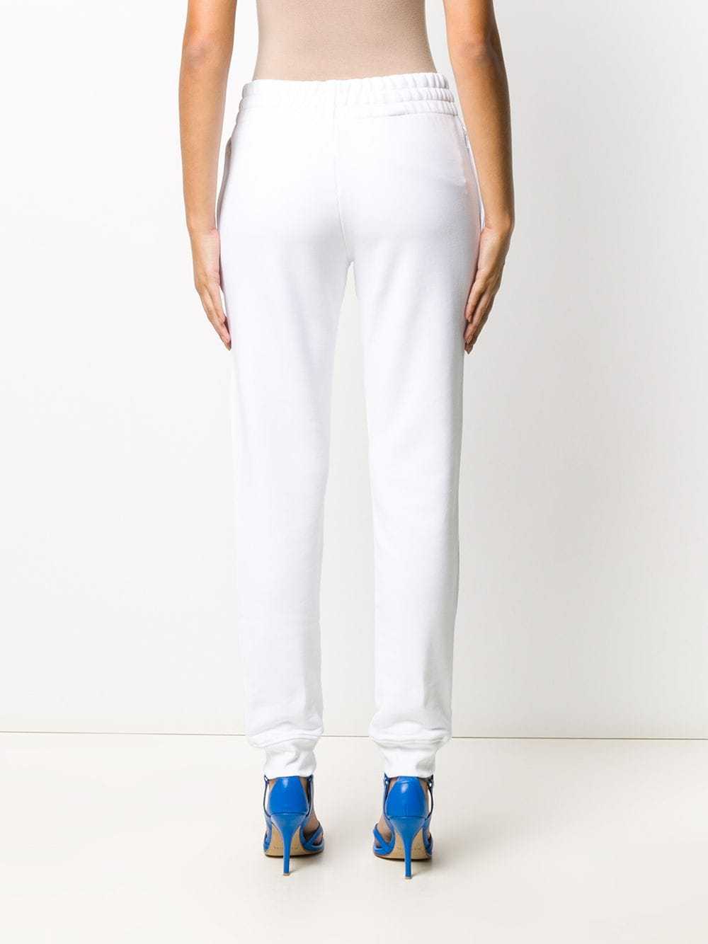 Moschino Logo Printed Sweatpants In White