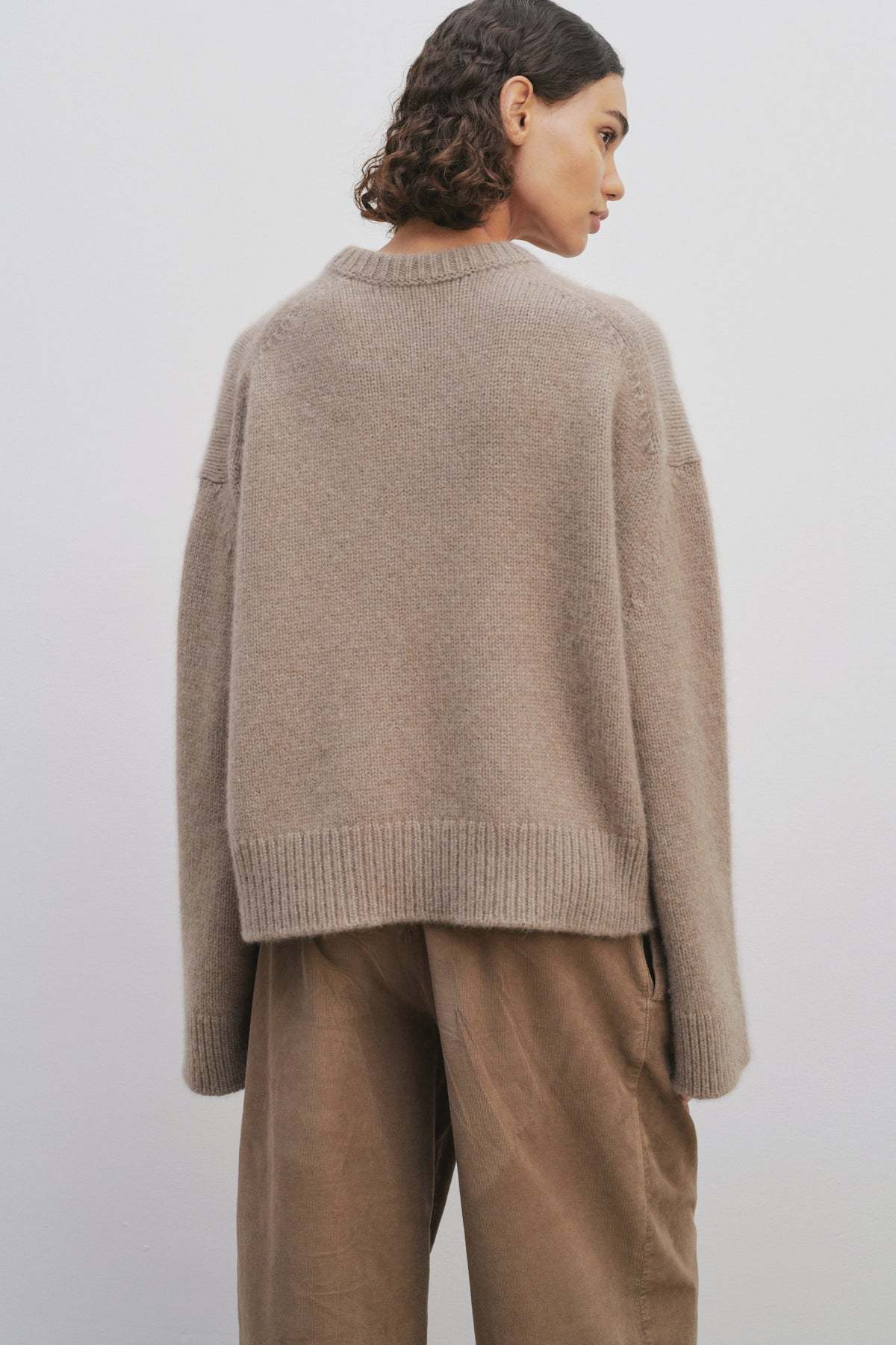 The Row Long-sleeved Cashmere Sweater In Brown