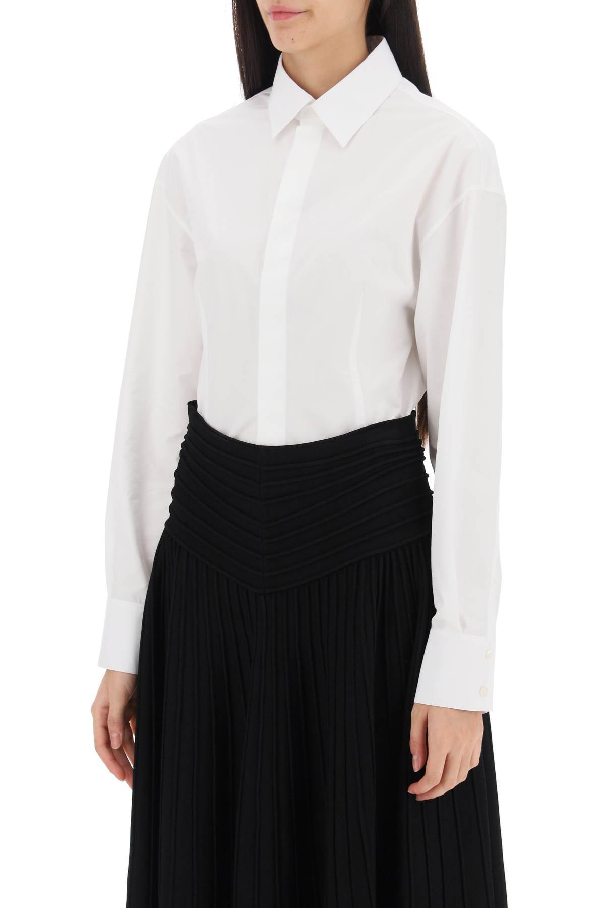 Alaïa Long-sleeved Lapel Jumpsuit In White