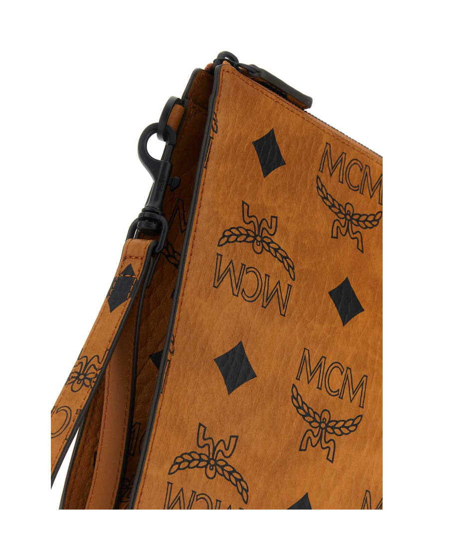 Mcm Logo Pattern Clutch In Brown