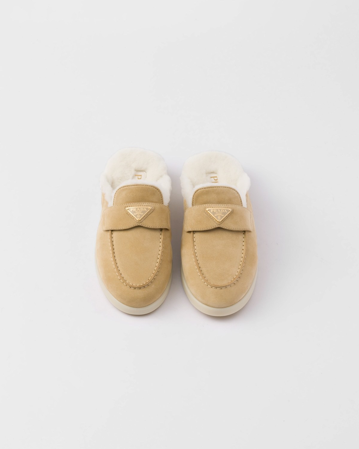 Prada Suede And Shearling Mules In True Color