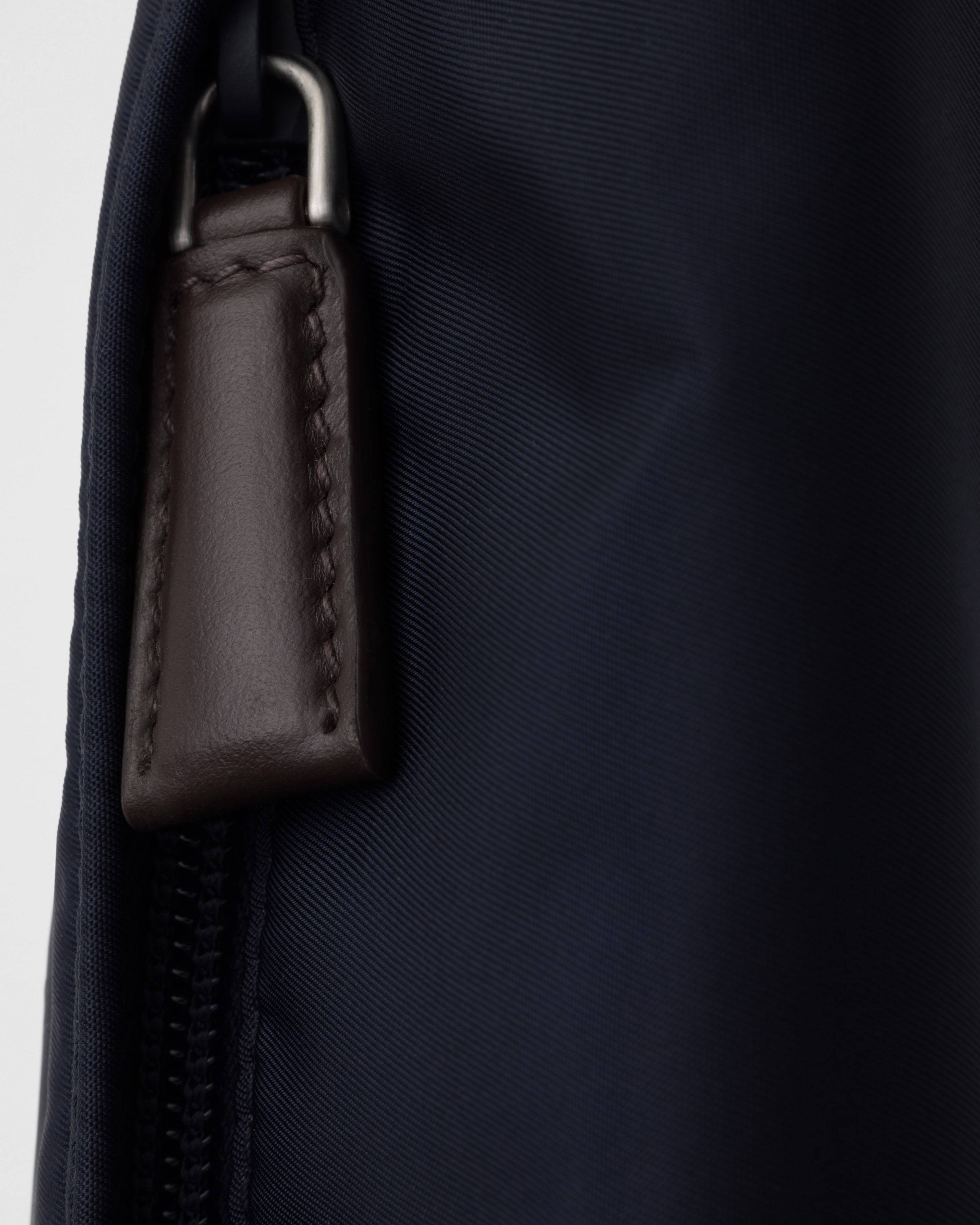 Prada Triangle-enamel Belt Bag In Blue/coffee