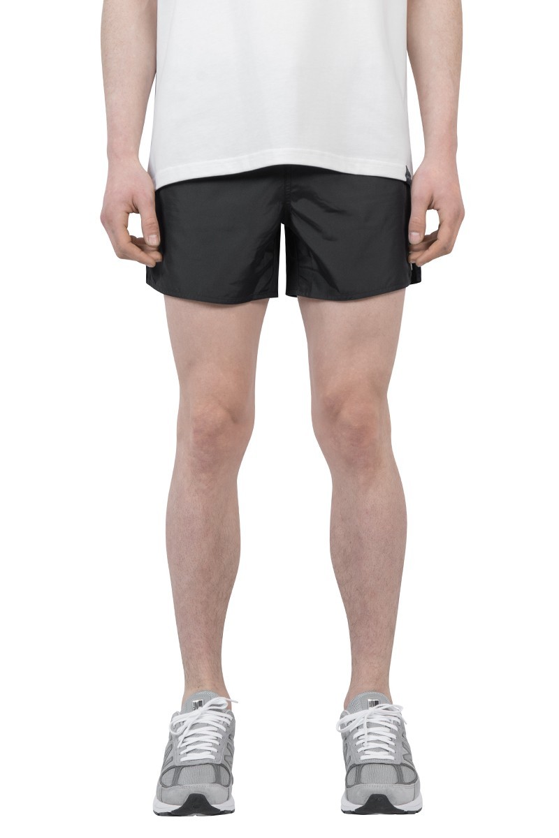 Courrèges Logo-patch Plain Swim Shorts In Black