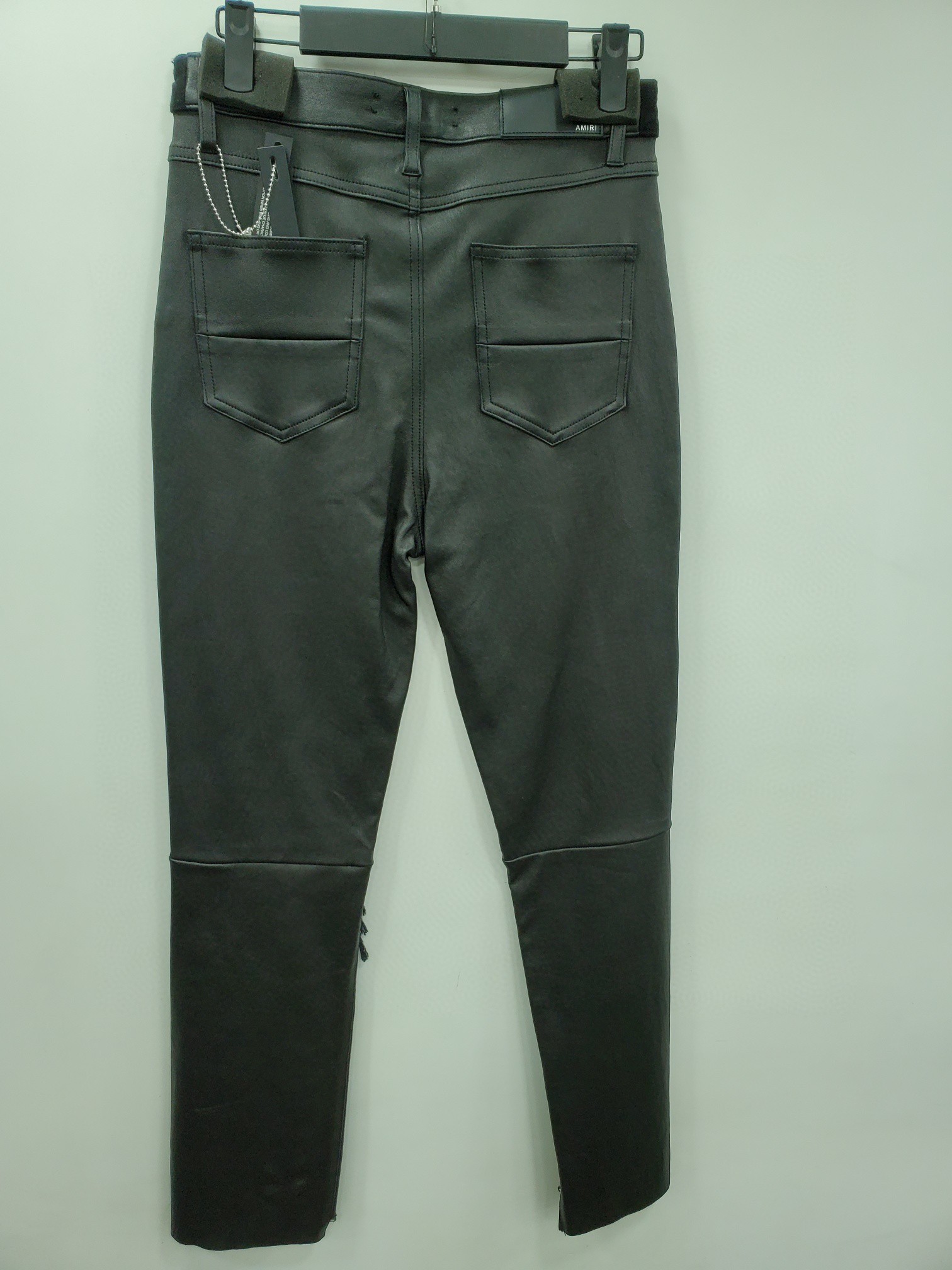Amiri Ripped Jeans With Details In Black