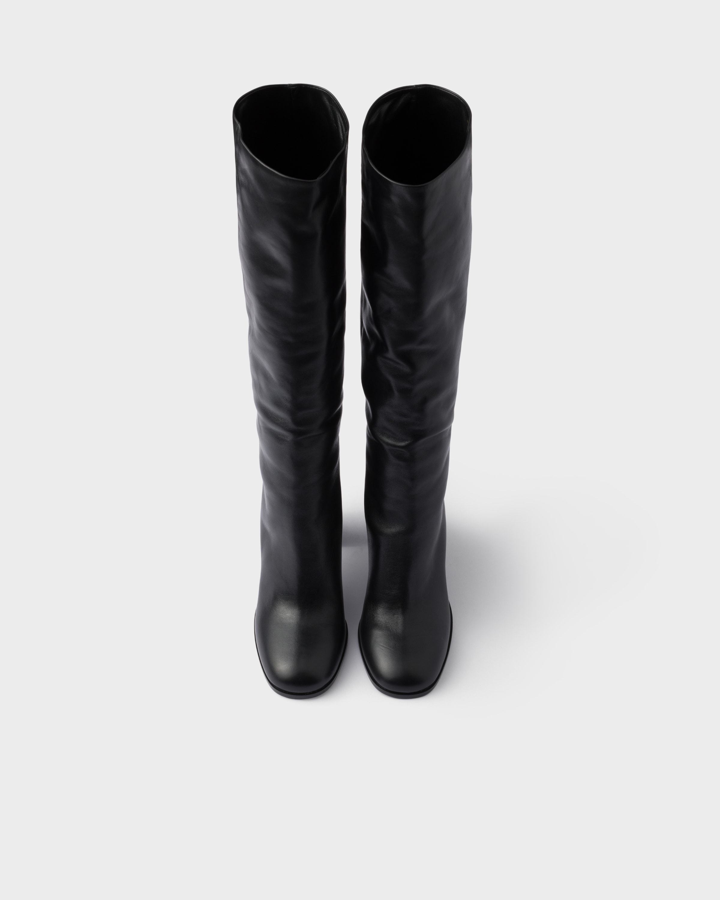 Prada Heeled Leather Boots In Black
