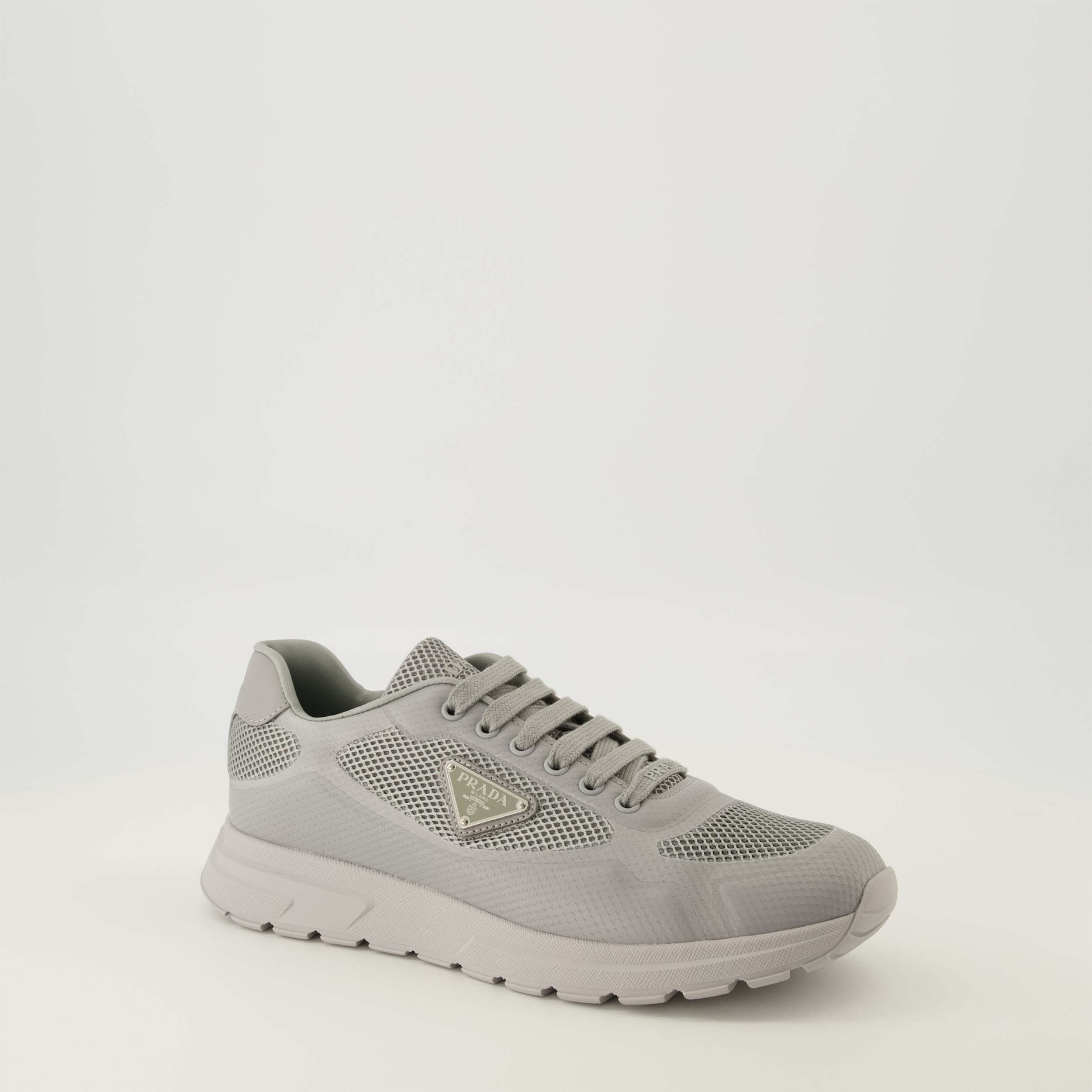 Prada Triangle-logo Lace-up Sneakers In Gray