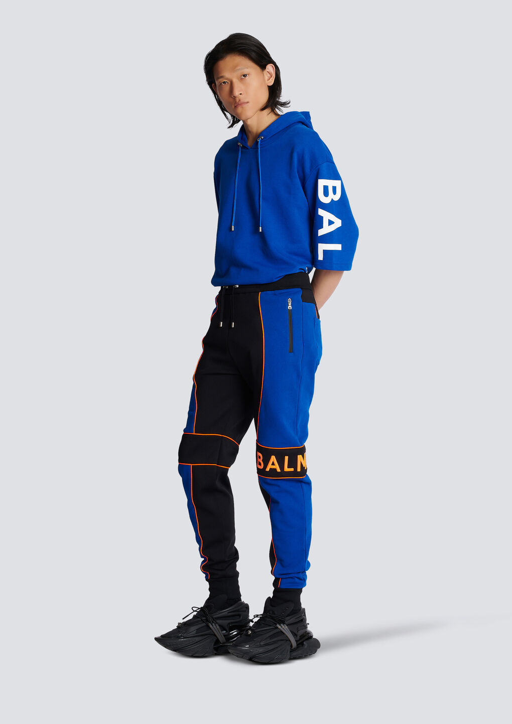 Shop Balmain Jogging Bottoms With  Logo Inserts In Black