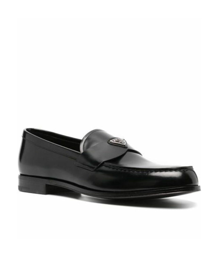 Prada Triangular Plaque Loafers In Black