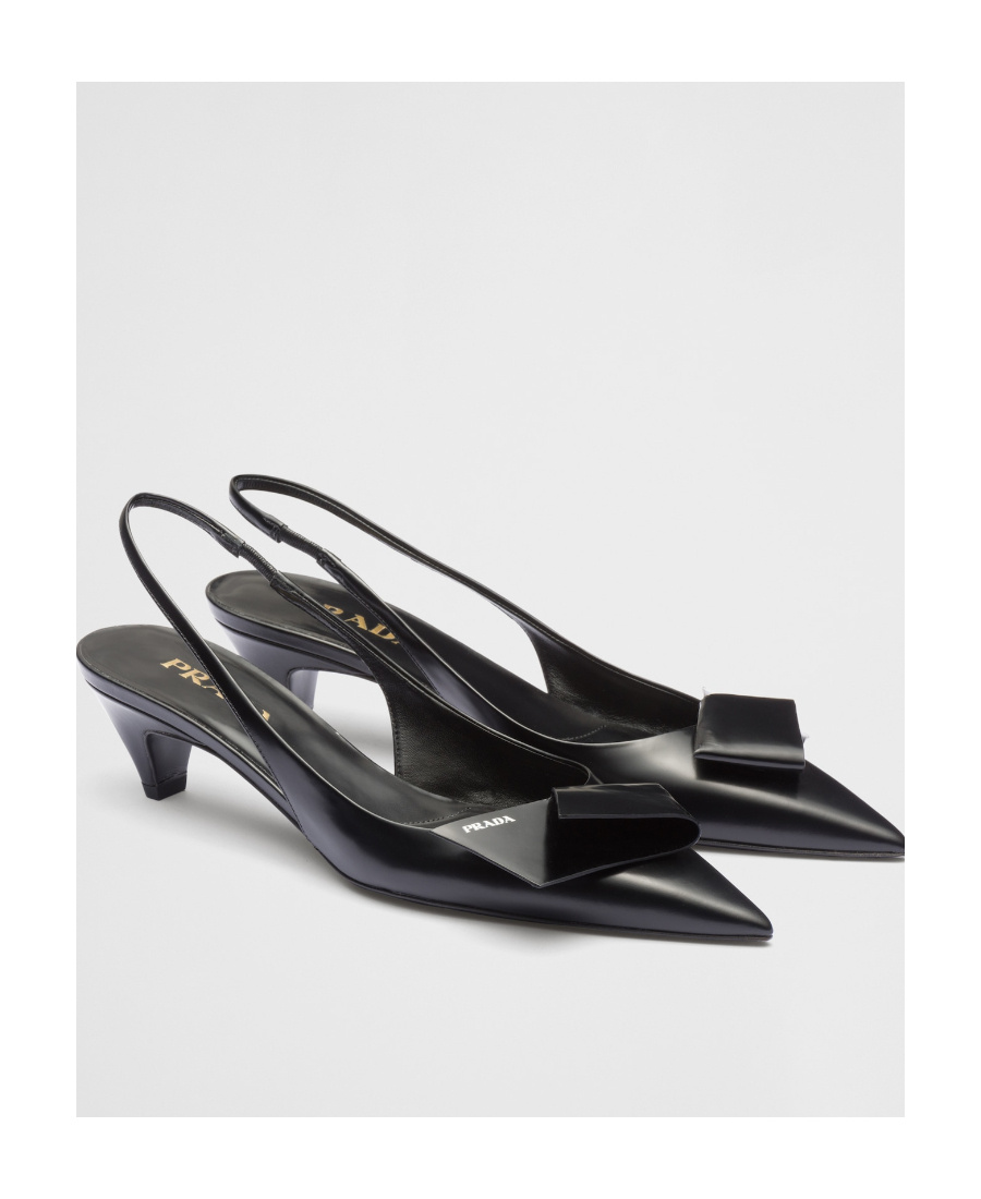 Prada Elegant Leather Slingback Pumps With Pointed Toe In Black