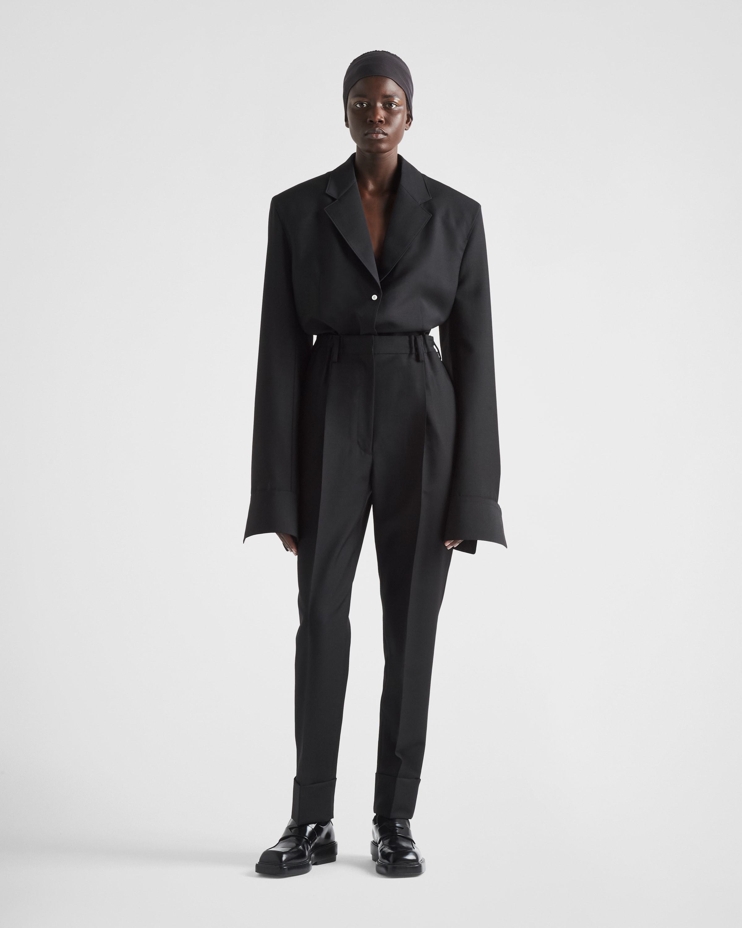 Prada Flared Wool Blend Pants In Black