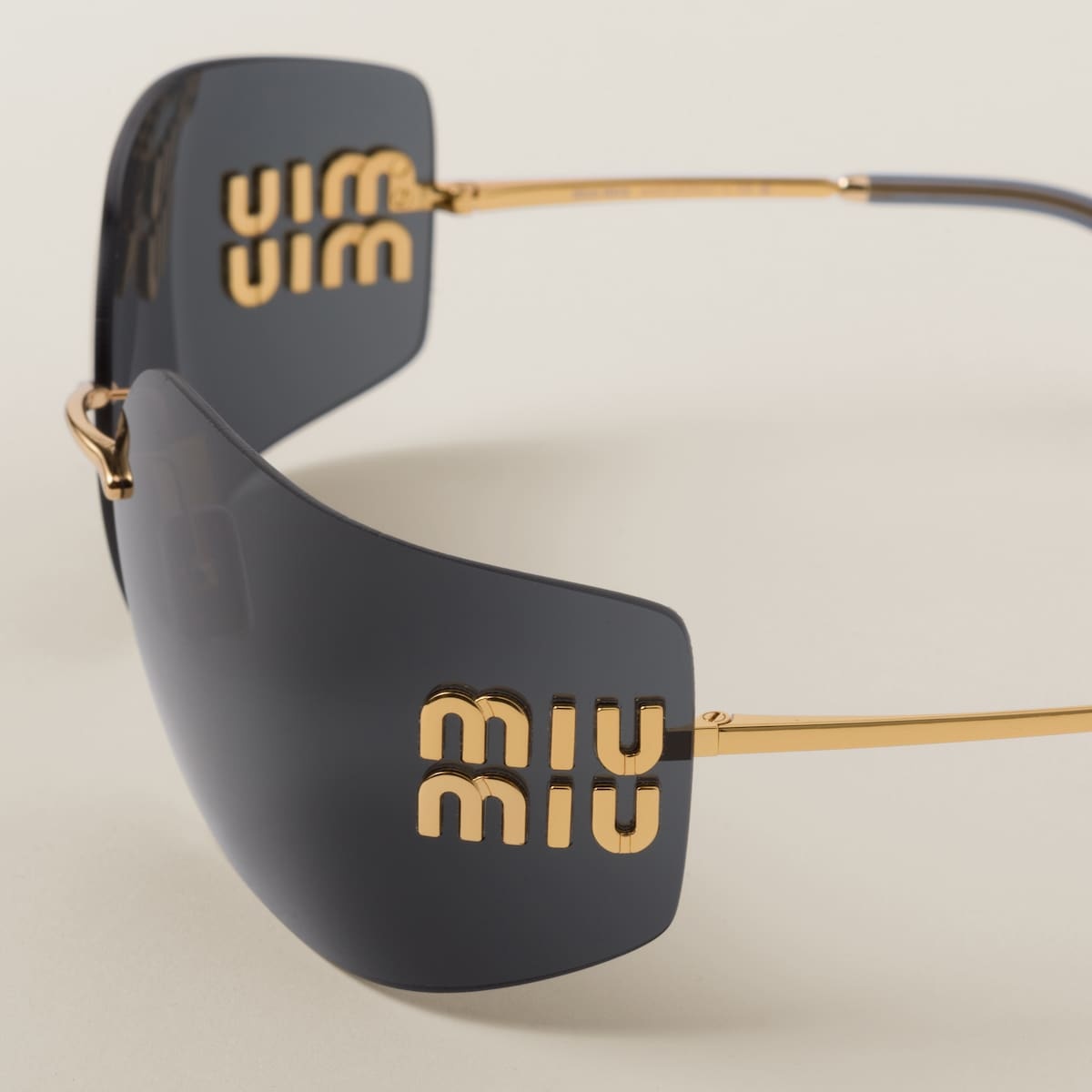 Miu Miu Mu 54ys 80 Rimless Titanium Wrap Sunglasses In Black