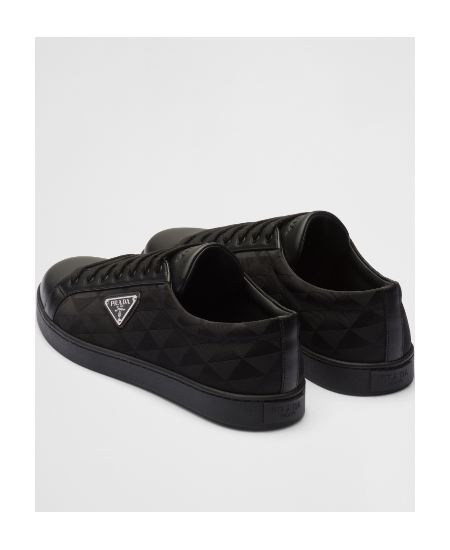 Shop Prada Leather And Nylon Sneakers In Black