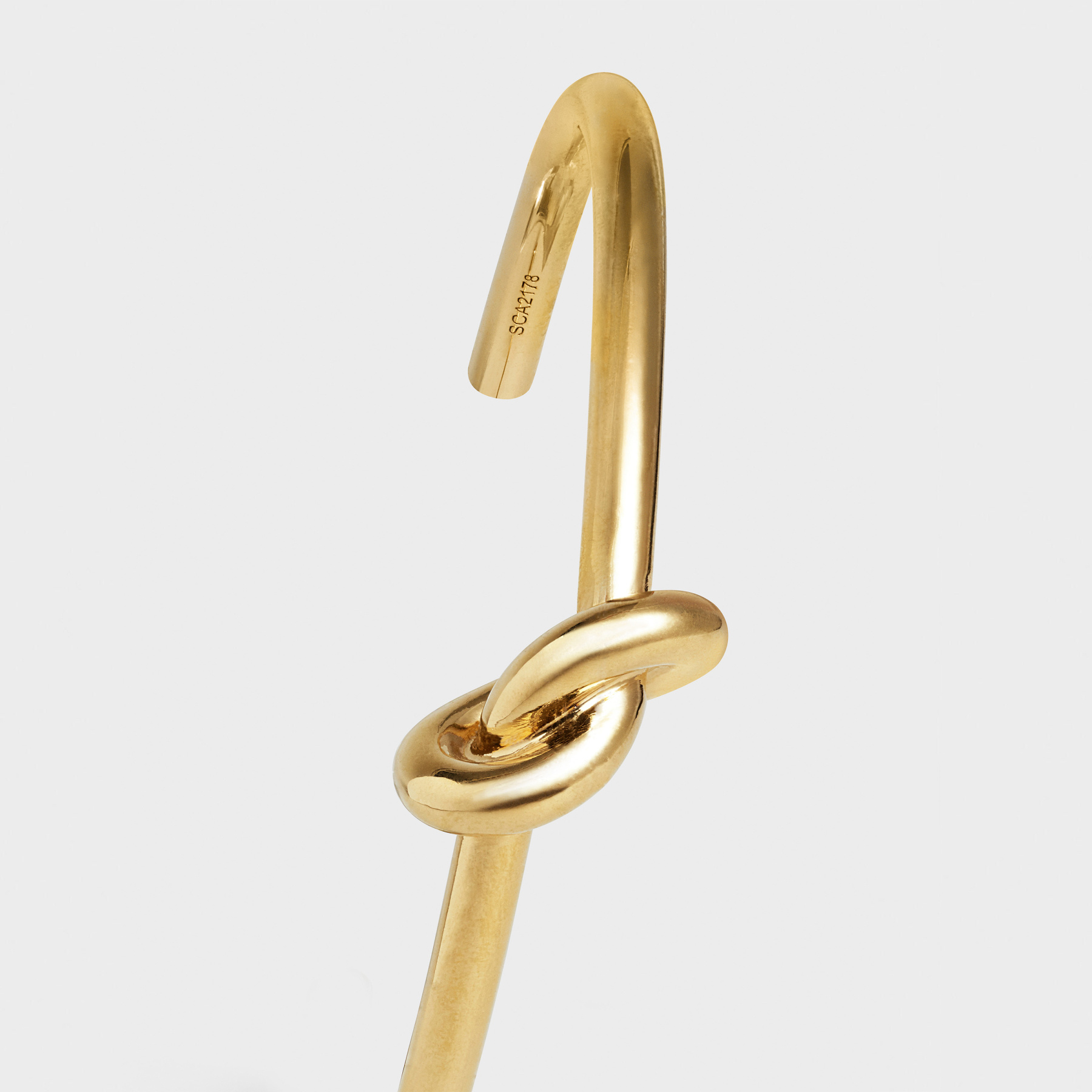 Celine Knot Ultra-thin Bracelet In Yellow