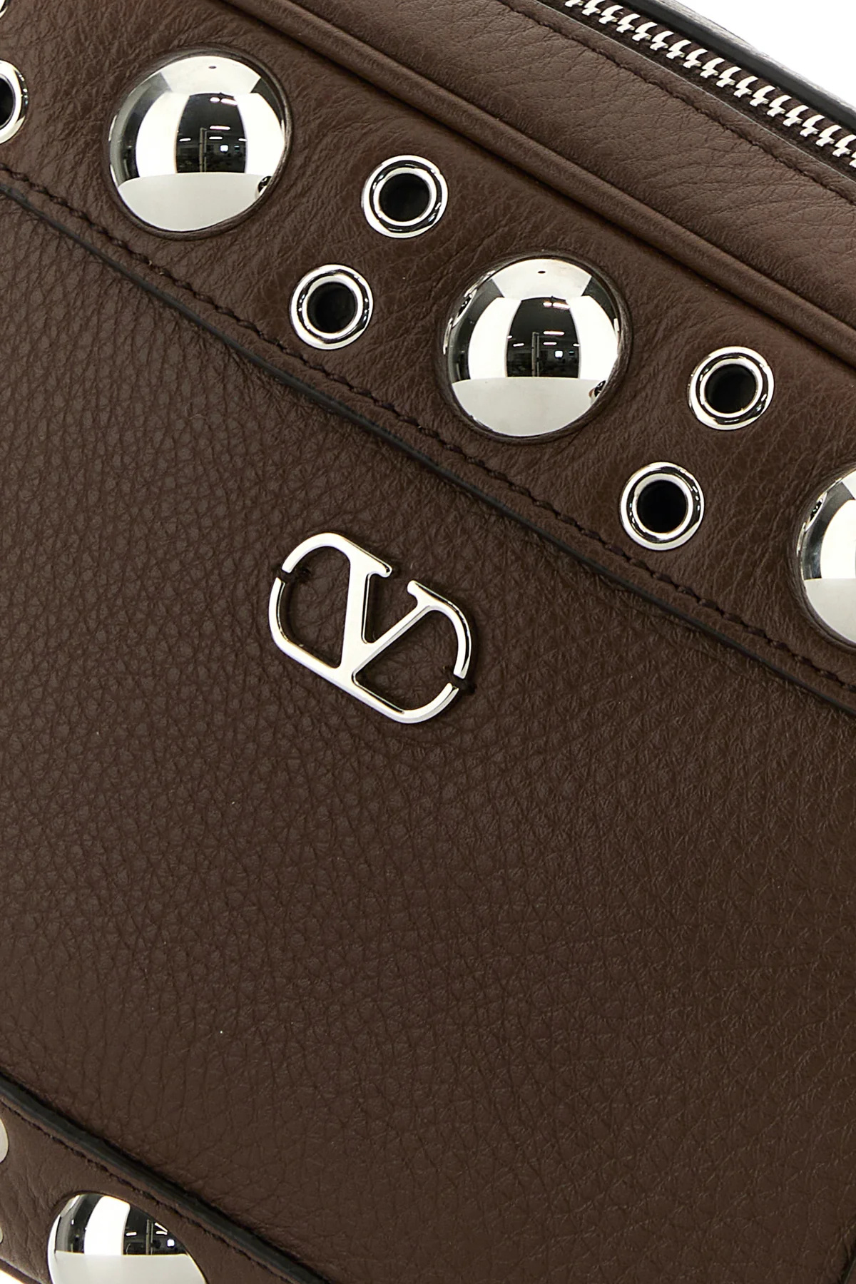 Valentino Garavani Dome-shaped Crossbody Bag With Metallic Eyelets And Adjustable Strap In Black