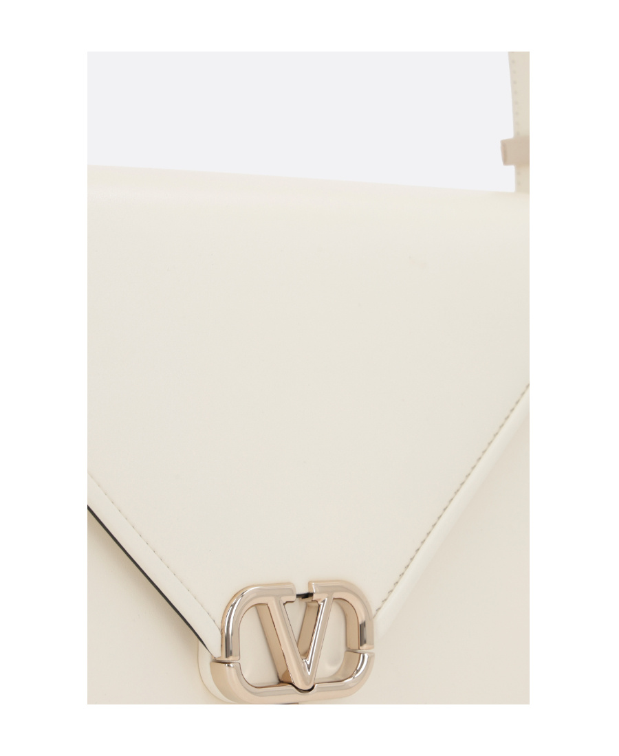 Valentino Logo Plaque Foldover Top Shoulder Bag In White