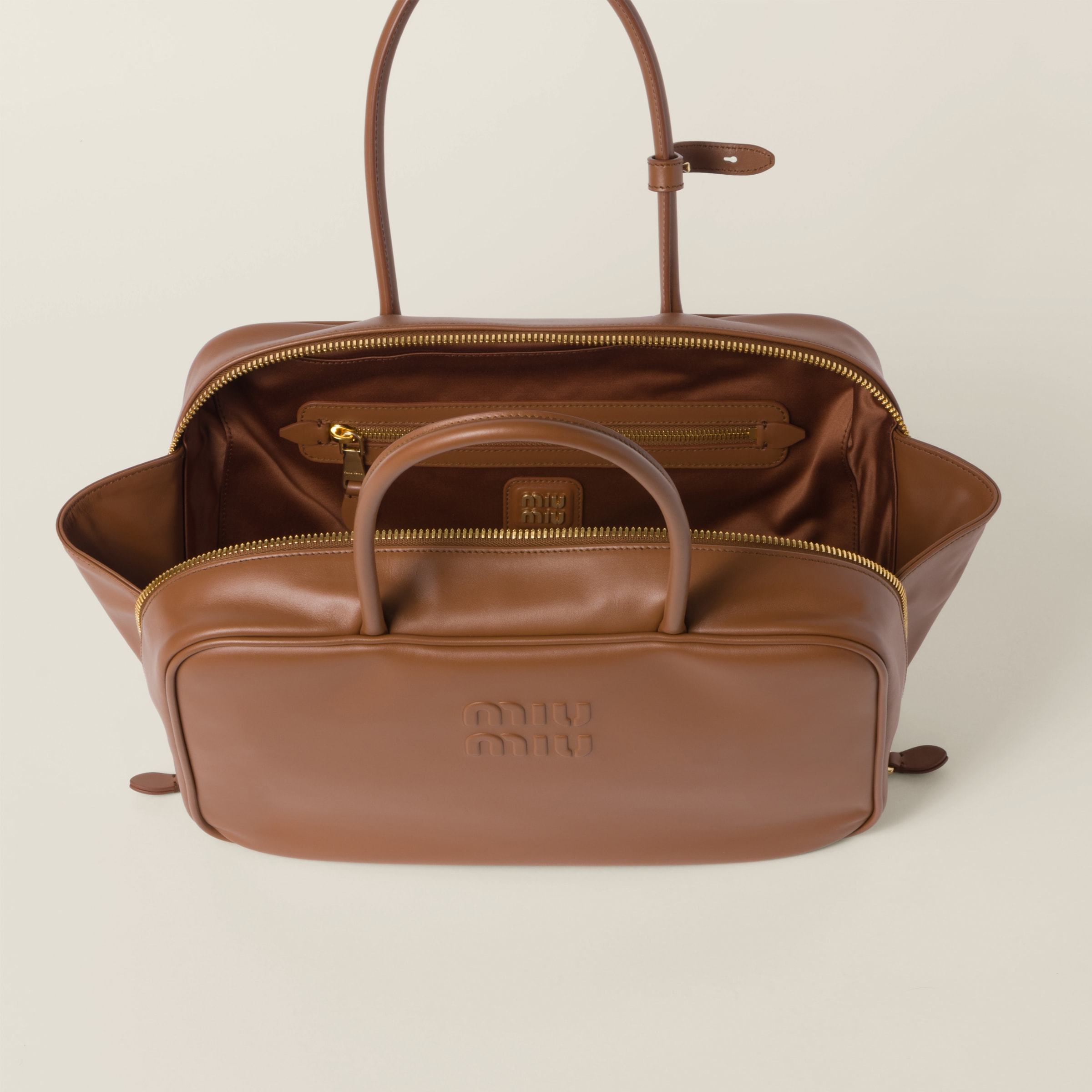 Miu Miu Logo Pattern Shoulder Bag In Brown