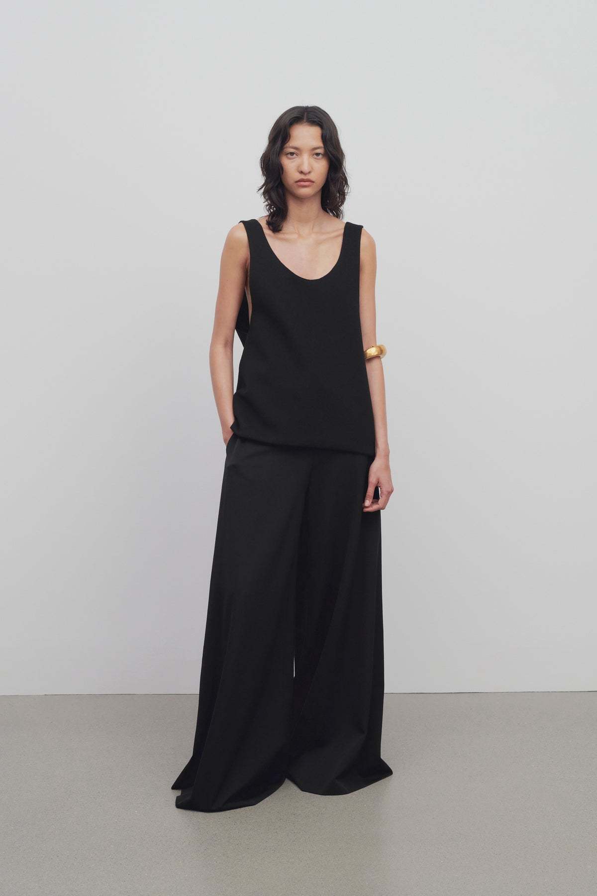 Shop The Row Dela Wool Palazzo Pants In Black