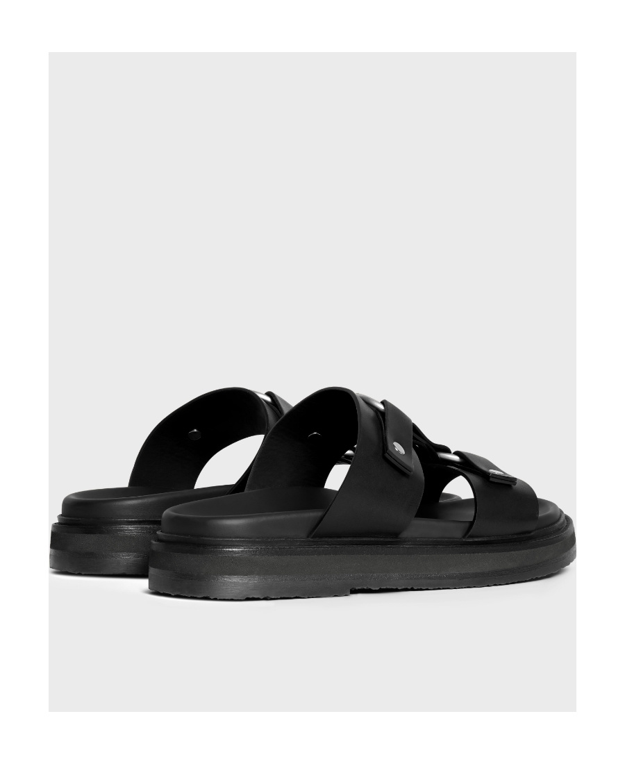 Celine Tippi-vegetable Tanned Slippers In Black